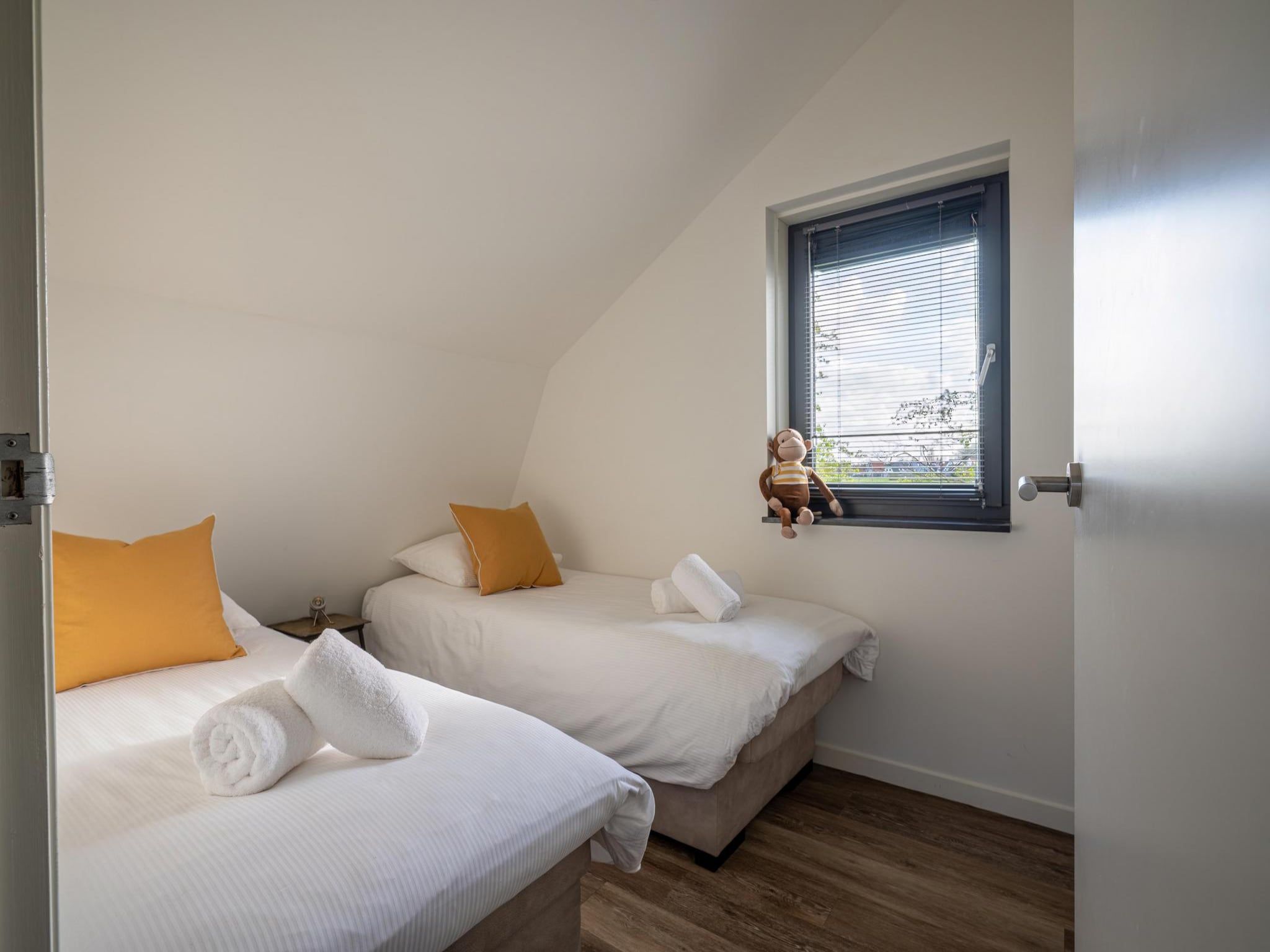Een slaapkamer van Zicht op de Molen in Egmond aan den Hoef