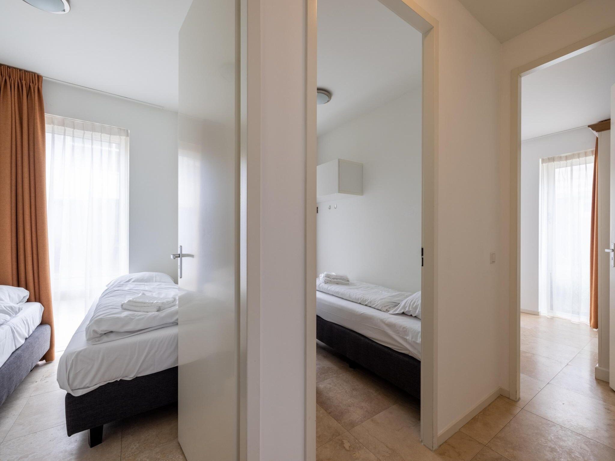 Een slaapkamer van Zilverlicht in Egmond aan Zee