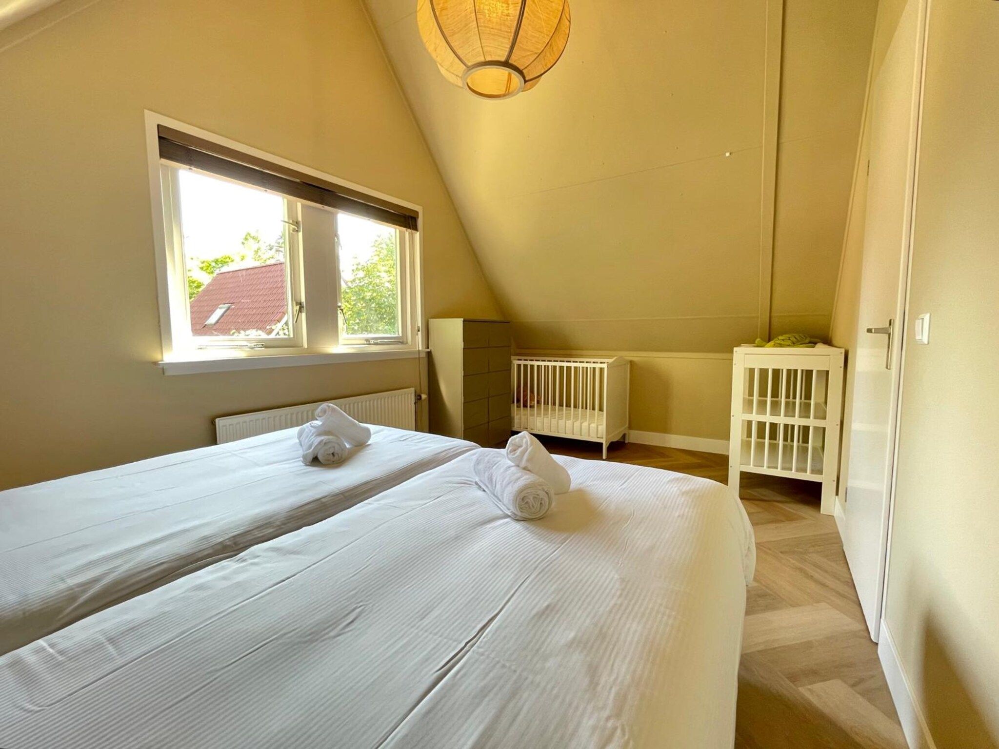 Een slaapkamer van Zon in de duinen - 33 in Sint Maarten
