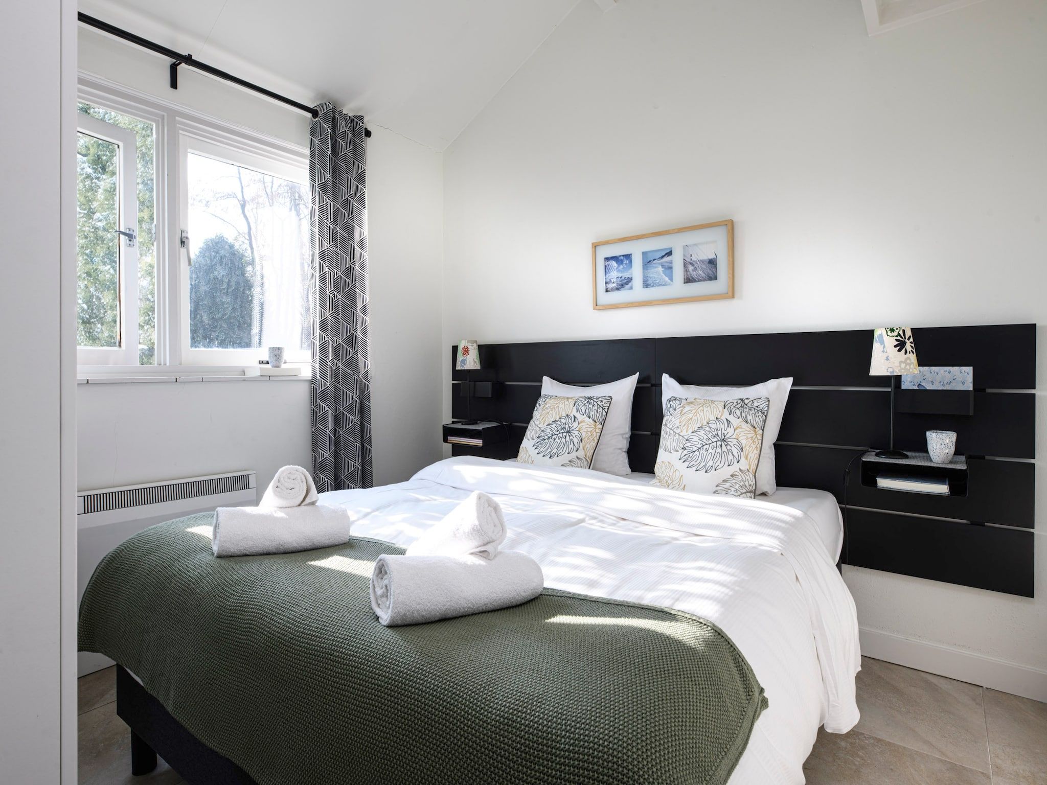 Een slaapkamer van Eiland Bungalow in Loosdrecht