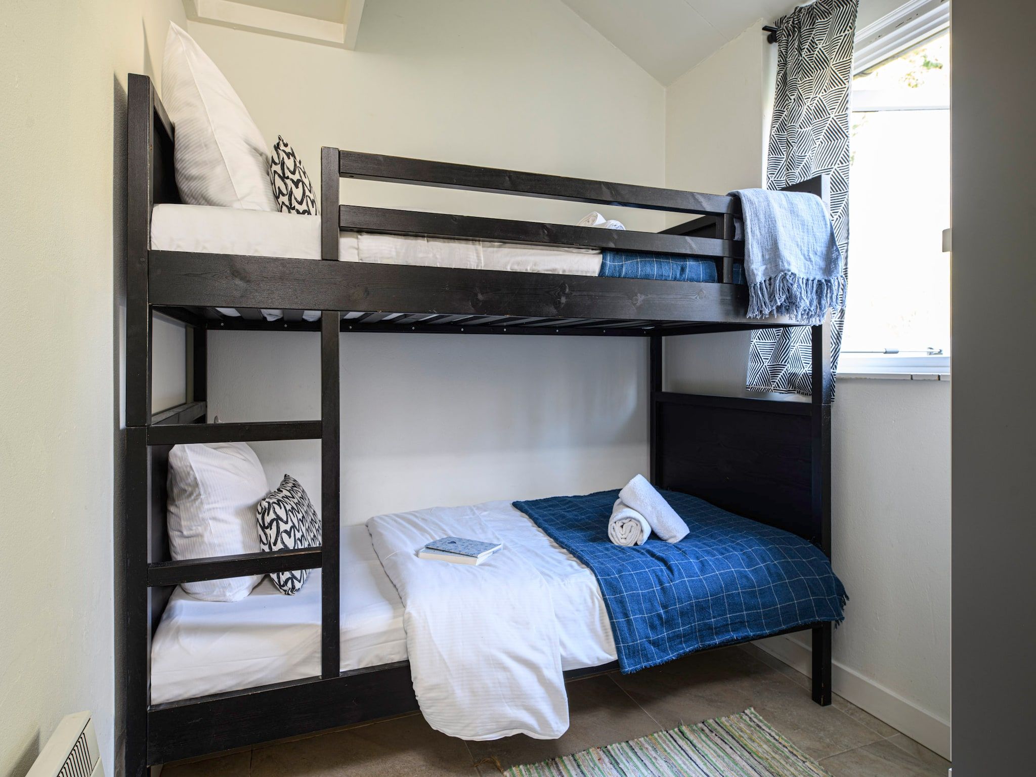 Een slaapkamer van Eiland Bungalow in Loosdrecht