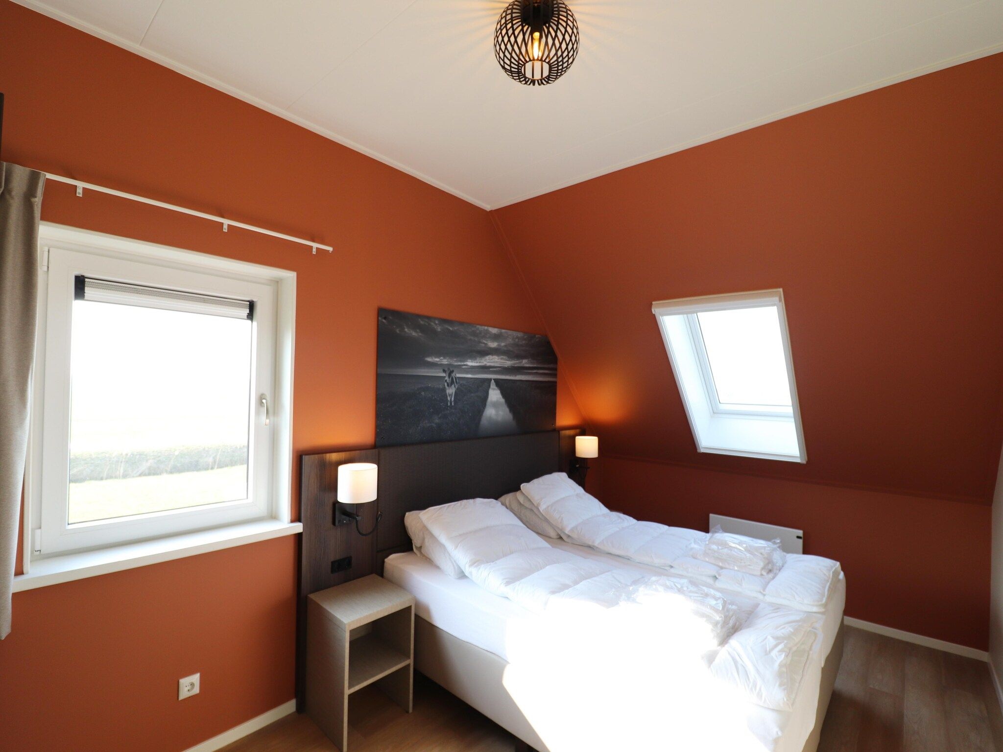 Een slaapkamer van Moderne villa op het Friese platteland in leons