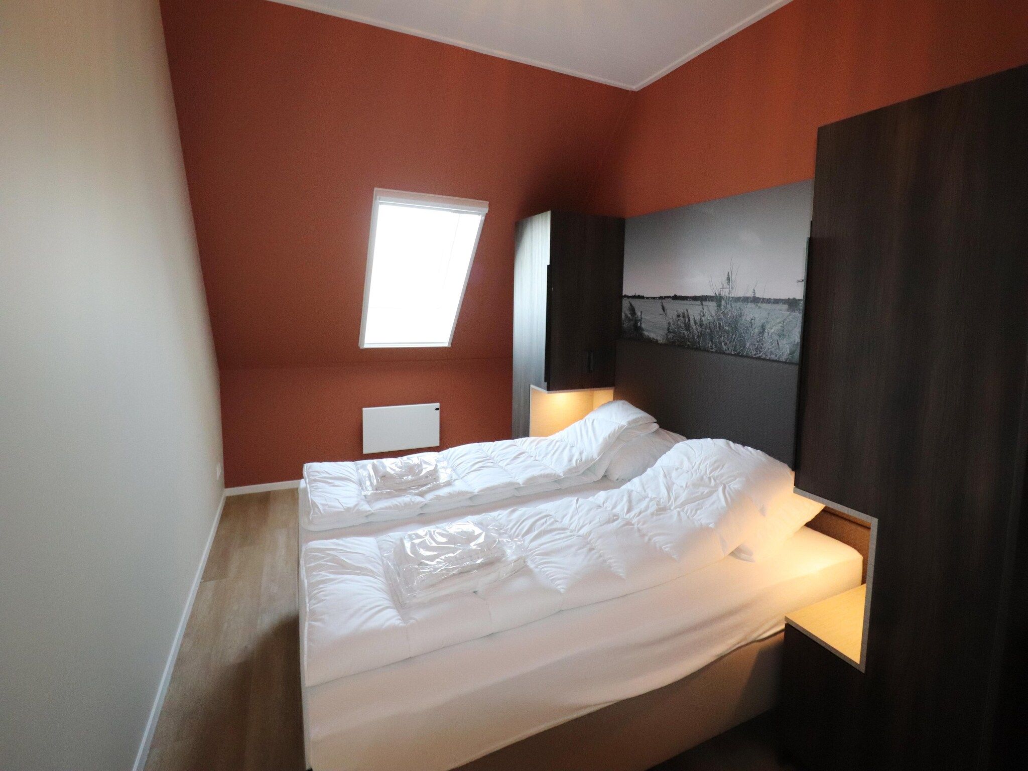 Een slaapkamer van Moderne villa op het Friese platteland in leons