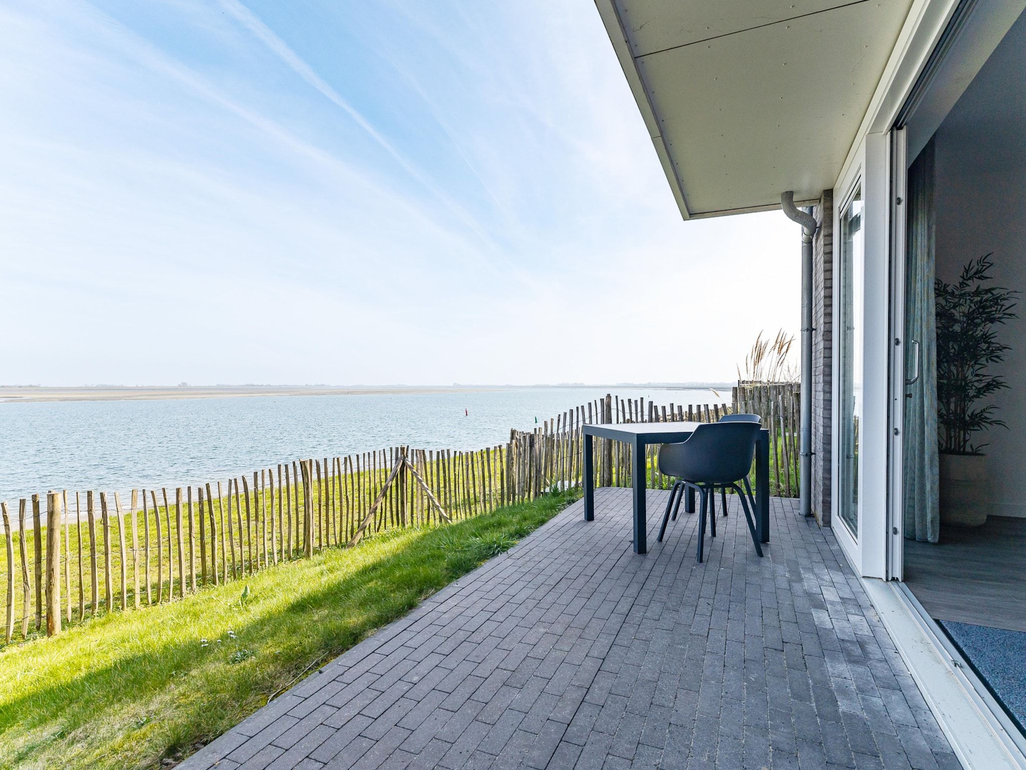 Het terras van Vakantiewoning aan het strand - met tuin en terras | Nr. 20 | 2 Pers. | Vista Maris in Sint-Annaland