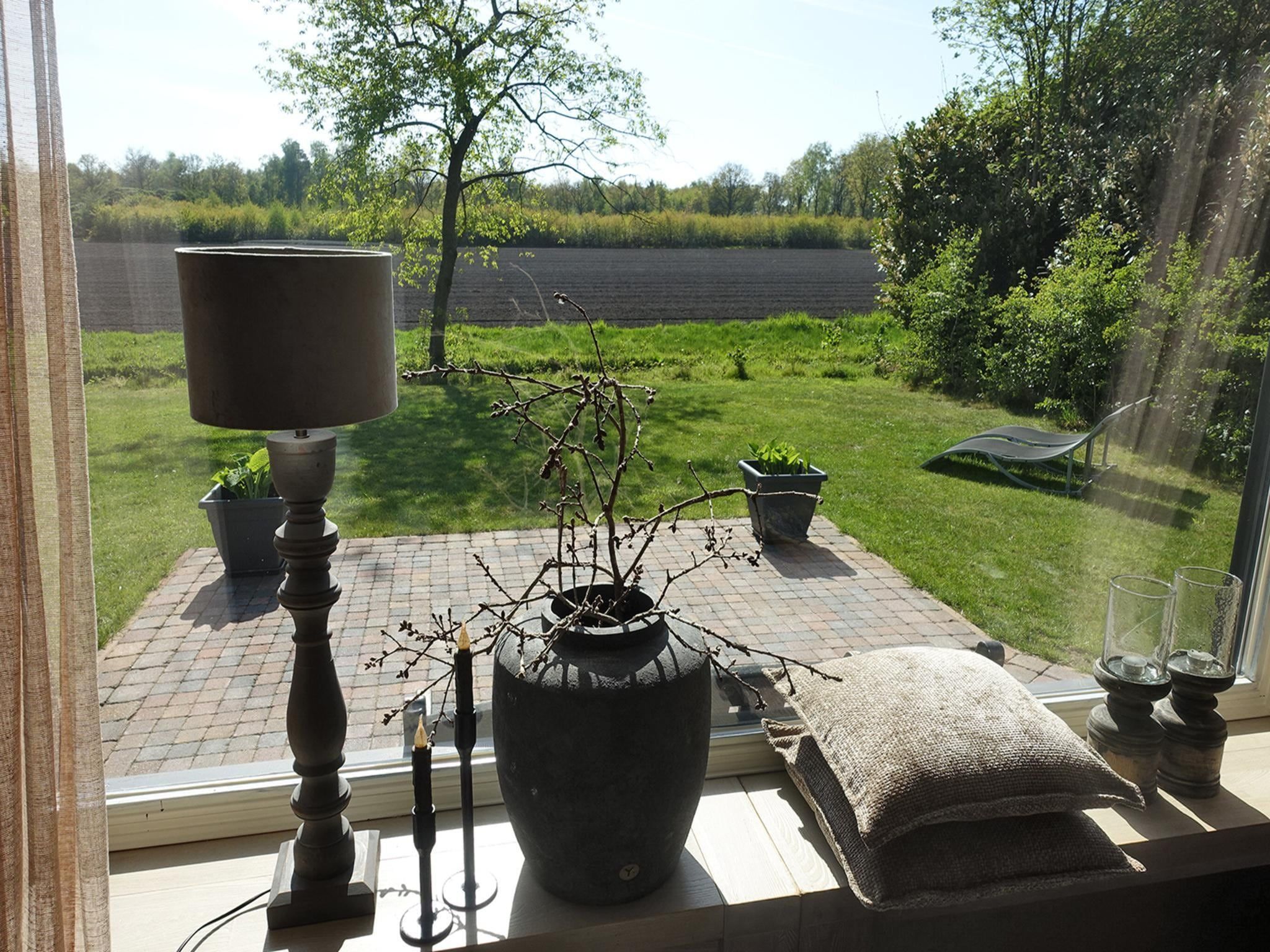 Het uitzicht vanaf Vechtdalchalet de Wilg in Rheezerveen