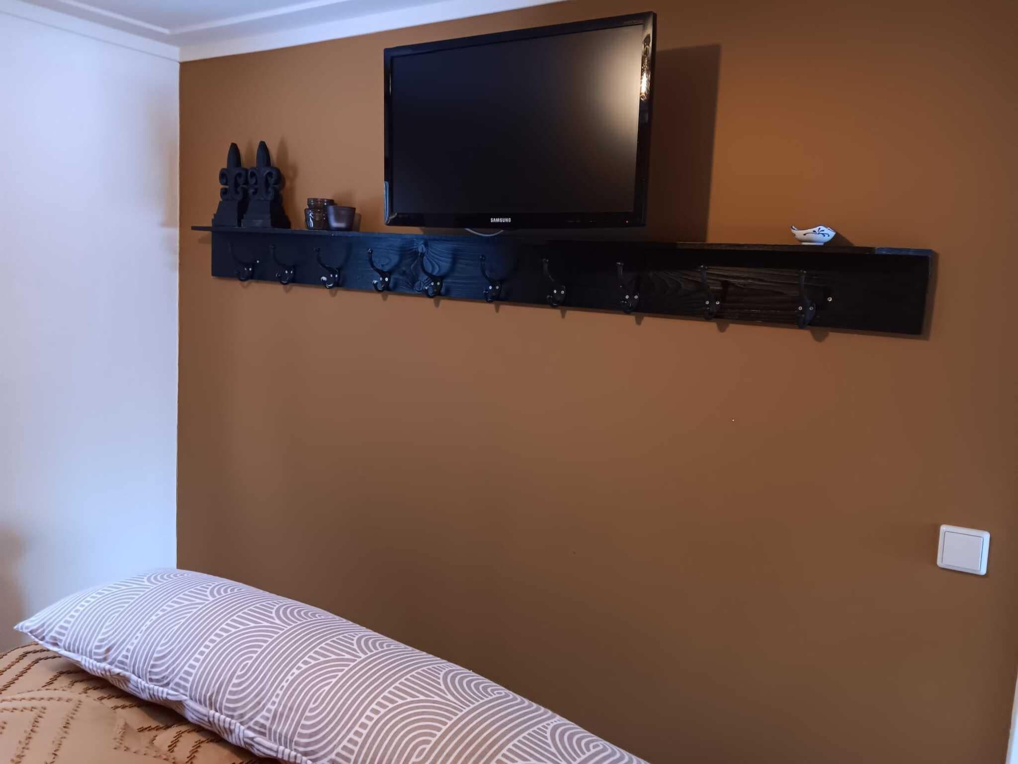 Een slaapkamer van Vechtdalchalet de Wilg in Rheezerveen