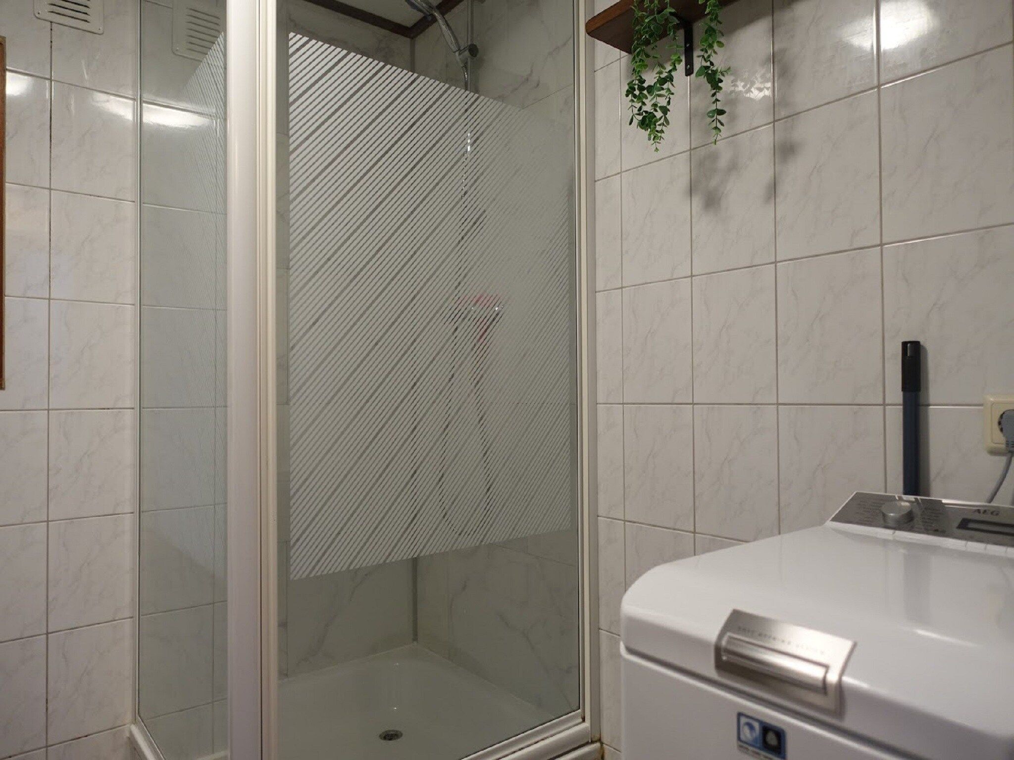 De badkamer van Vechtdalchalet de Eik in Rheezerveen