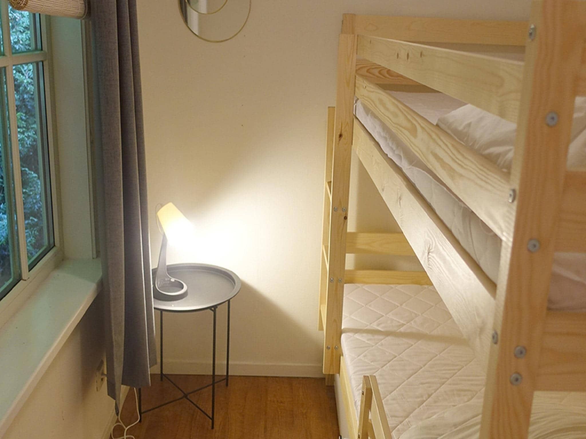 Een slaapkamer van Vechtdalchalet de Eik in Rheezerveen
