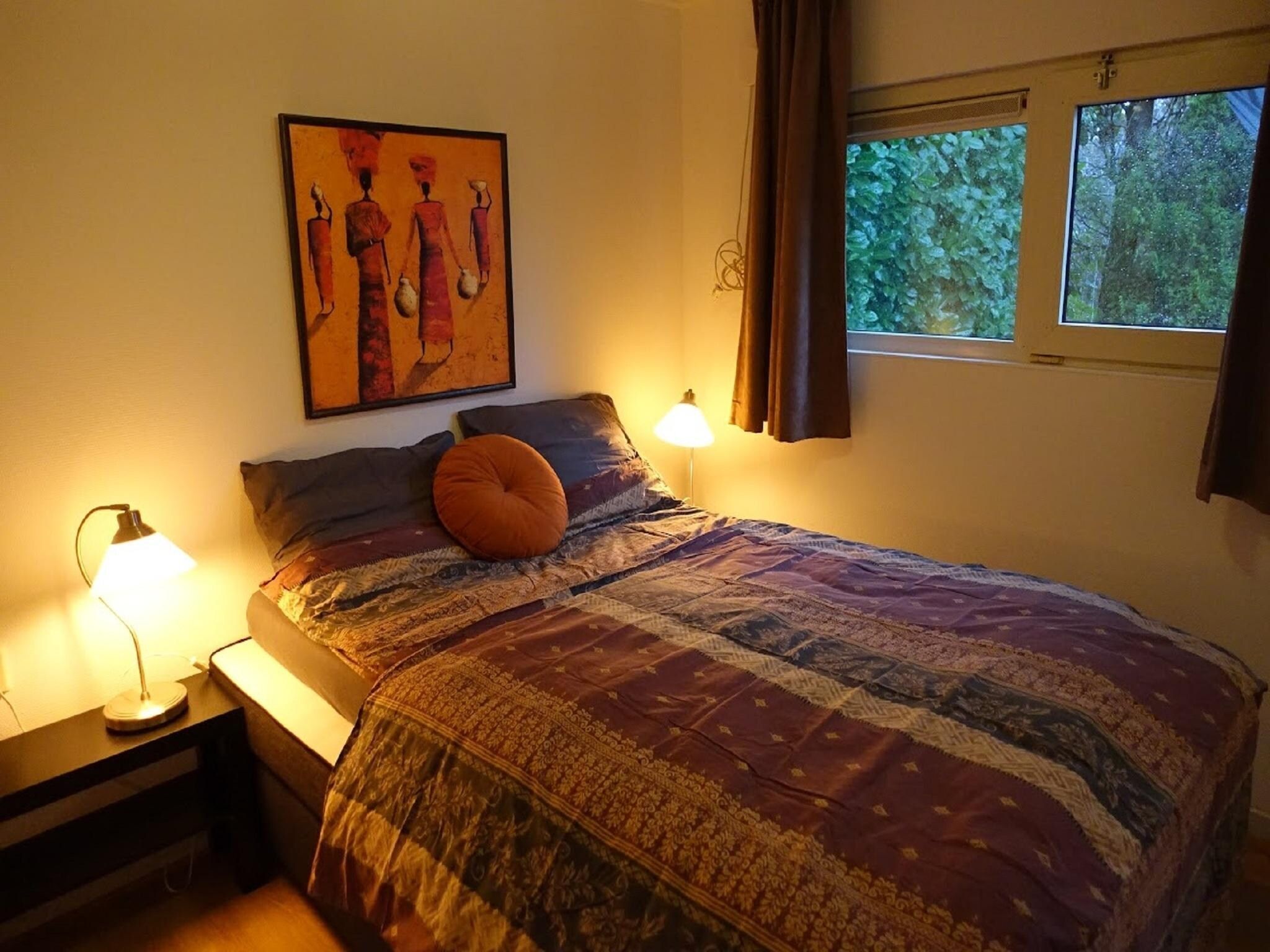 Een slaapkamer van Vechtdalchalet de Eik in Rheezerveen