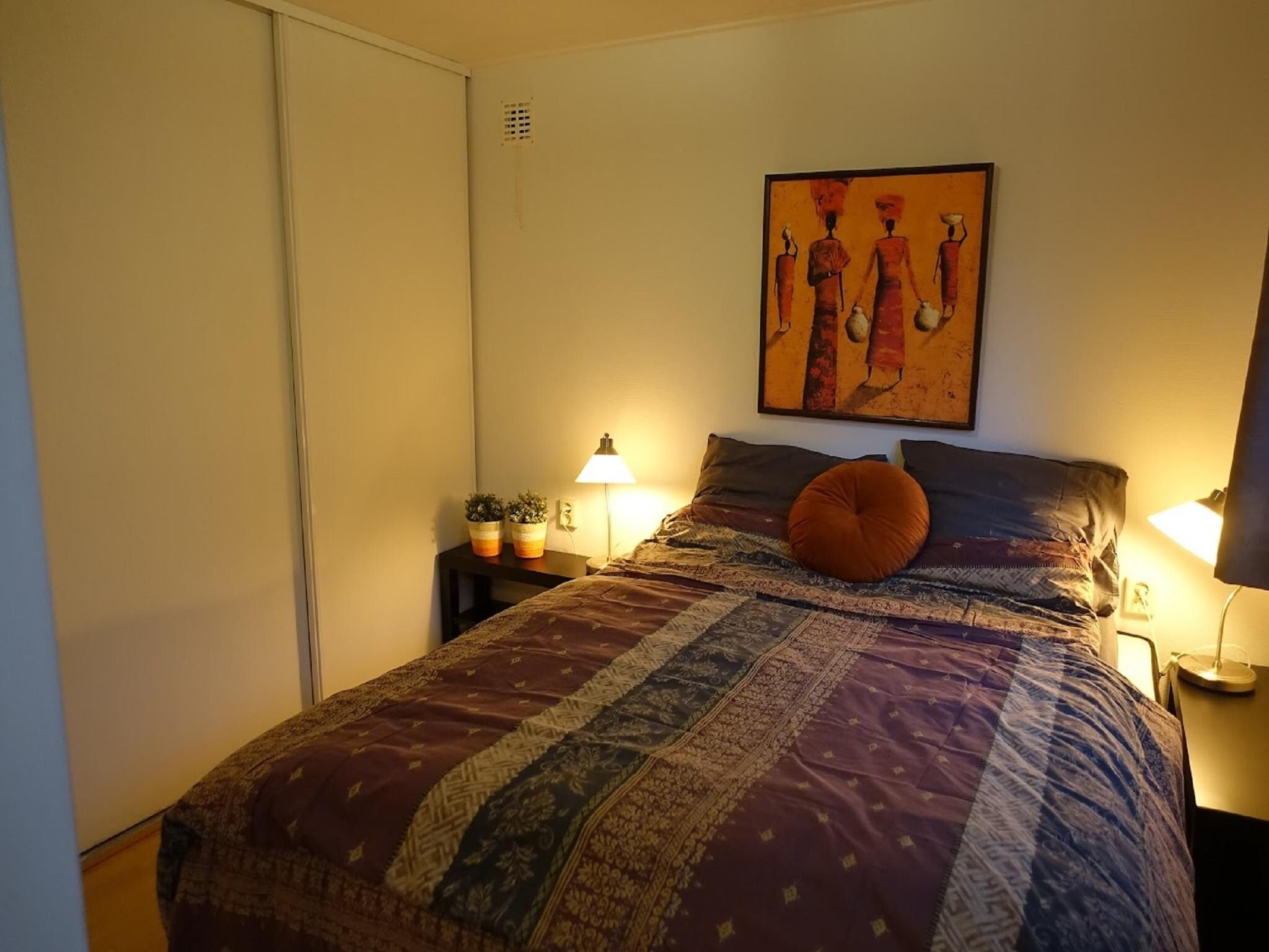 Een slaapkamer van Vechtdalchalet de Eik in Rheezerveen