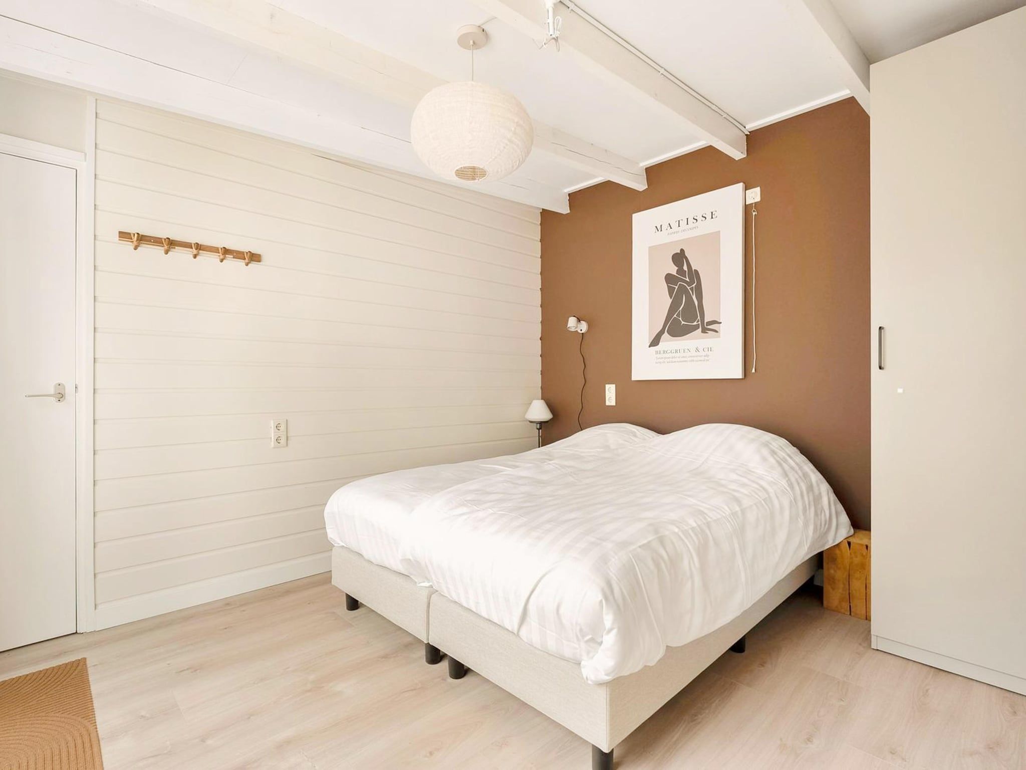 Een slaapkamer van Duinland 118 in Sint Maartensvlotbrug