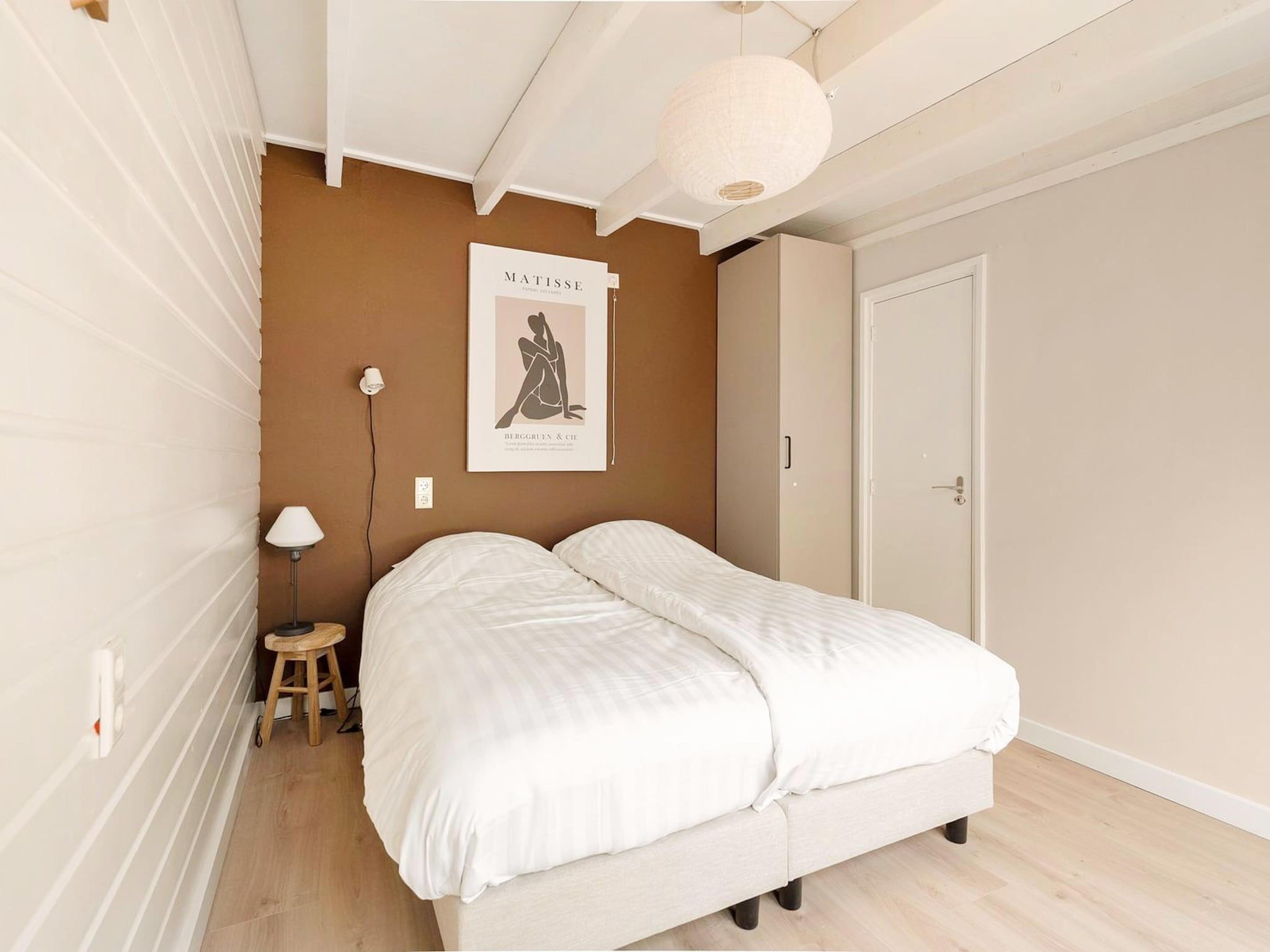 Een slaapkamer van Duinland 118 in Sint Maartensvlotbrug