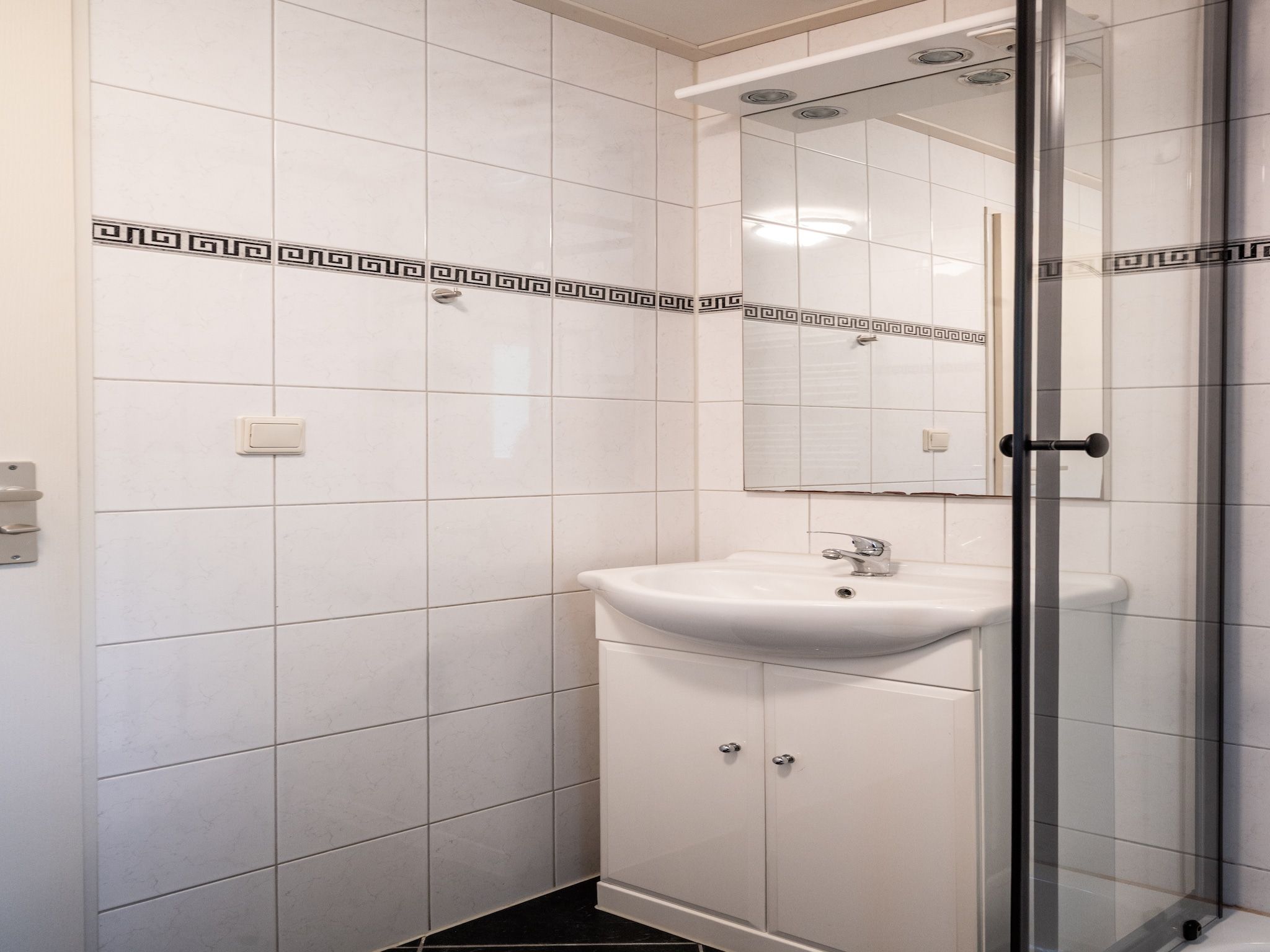 De badkamer van Vakantie home Coevorderweg in Stegeren