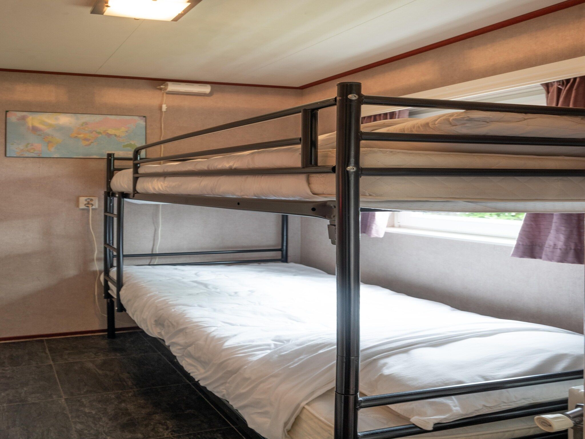 Een slaapkamer van Vakantie home Coevorderweg in Stegeren