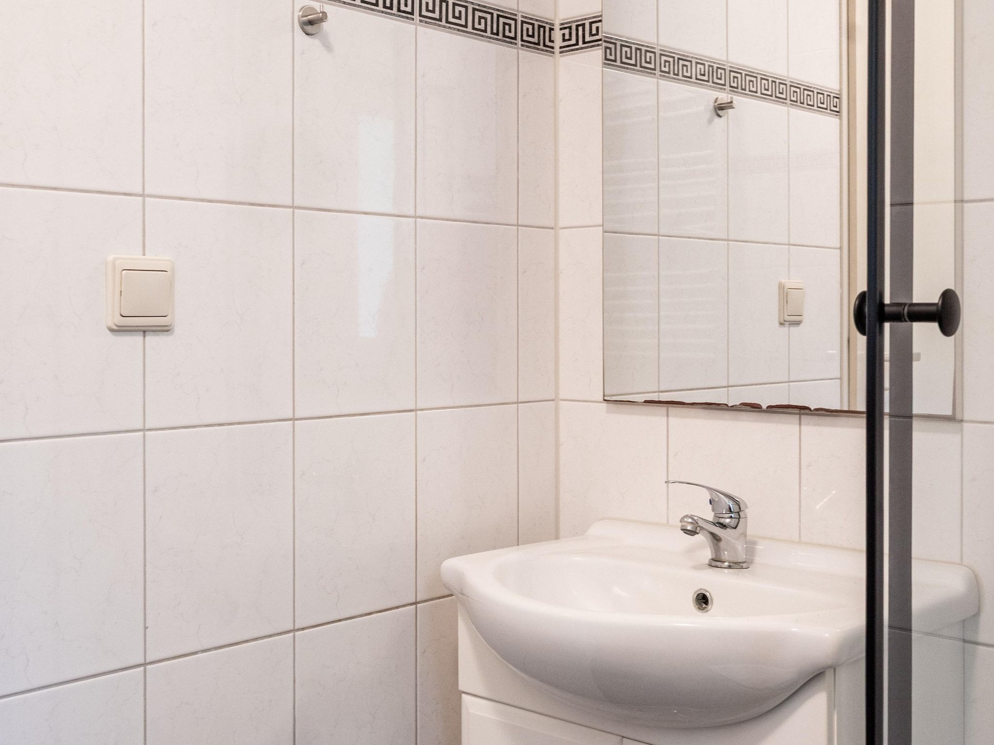 De badkamer van Vakantie home Coevorderweg in Stegeren