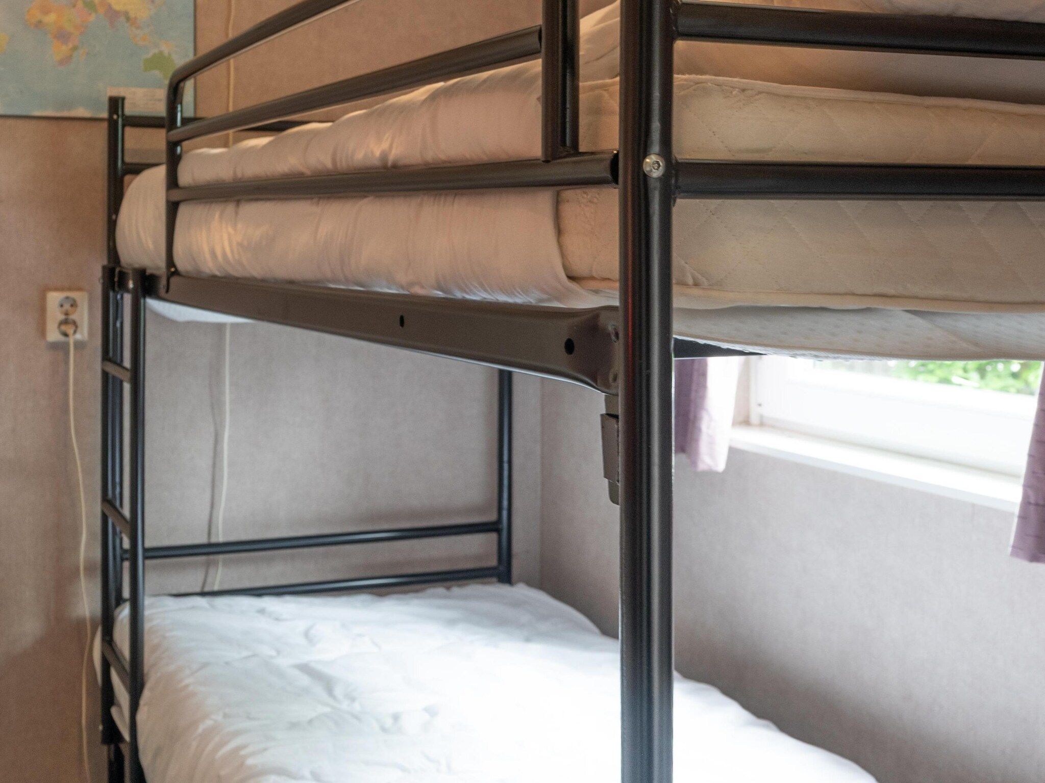 Een slaapkamer van Vakantie home Coevorderweg in Stegeren