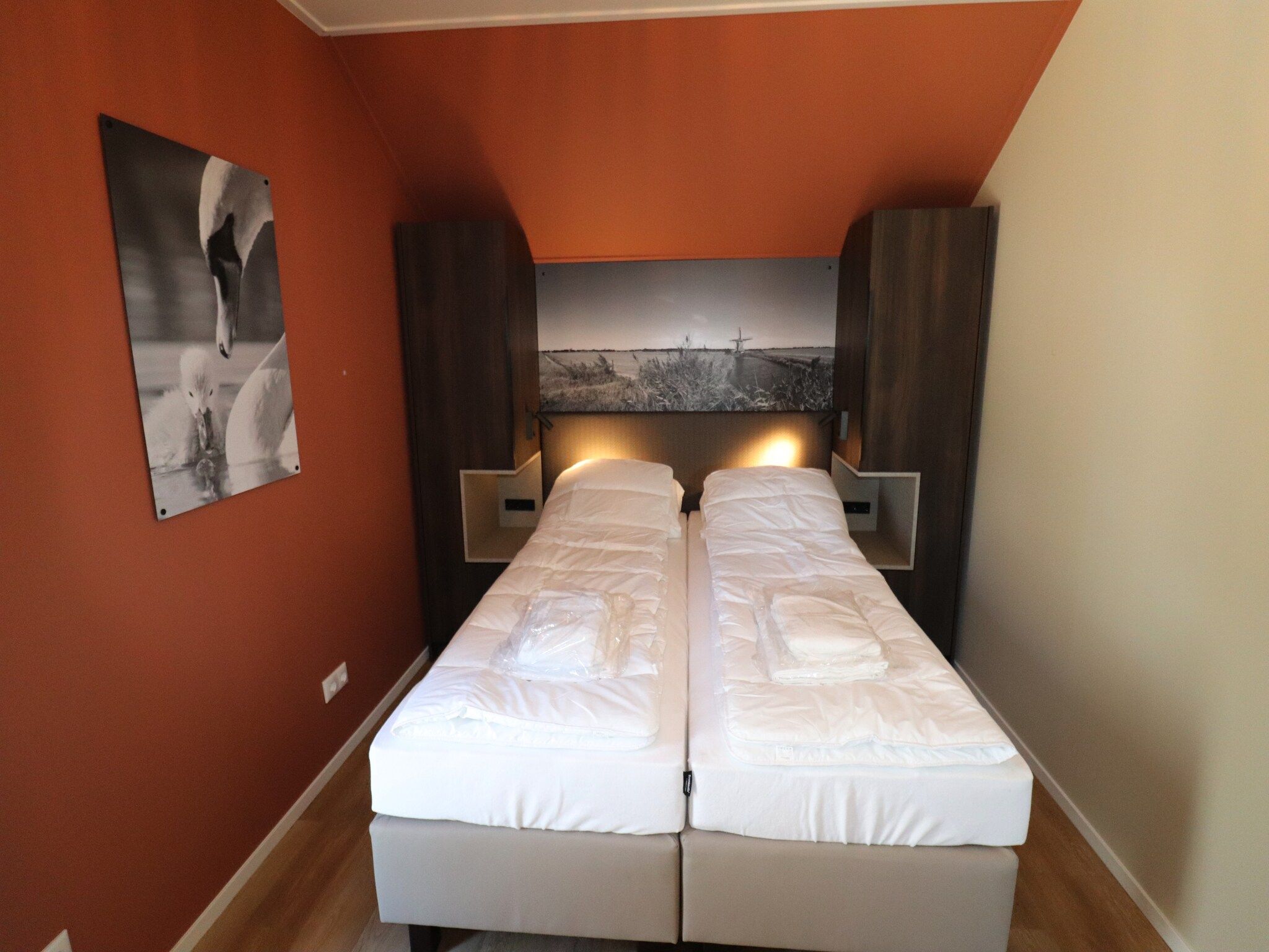 Een slaapkamer van Moderne hoekvilla middenin Friesland in leons