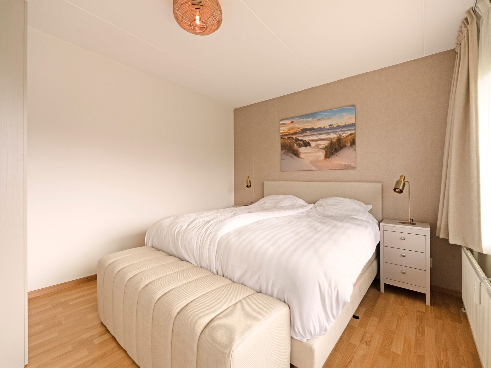 Een slaapkamer van Beach Appartement 13 in Callantsoog