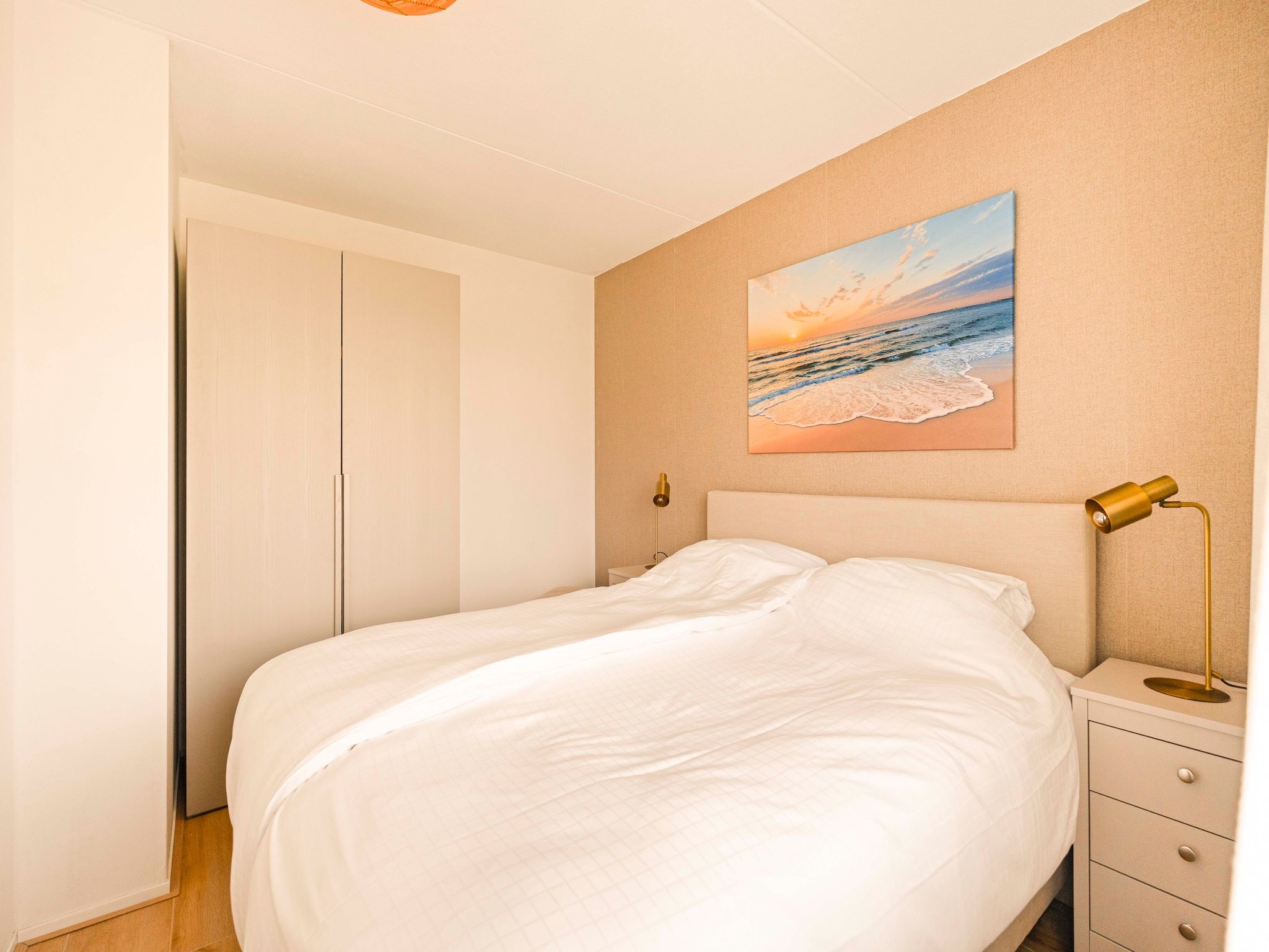Een slaapkamer van Beach Appartement 13 in Callantsoog