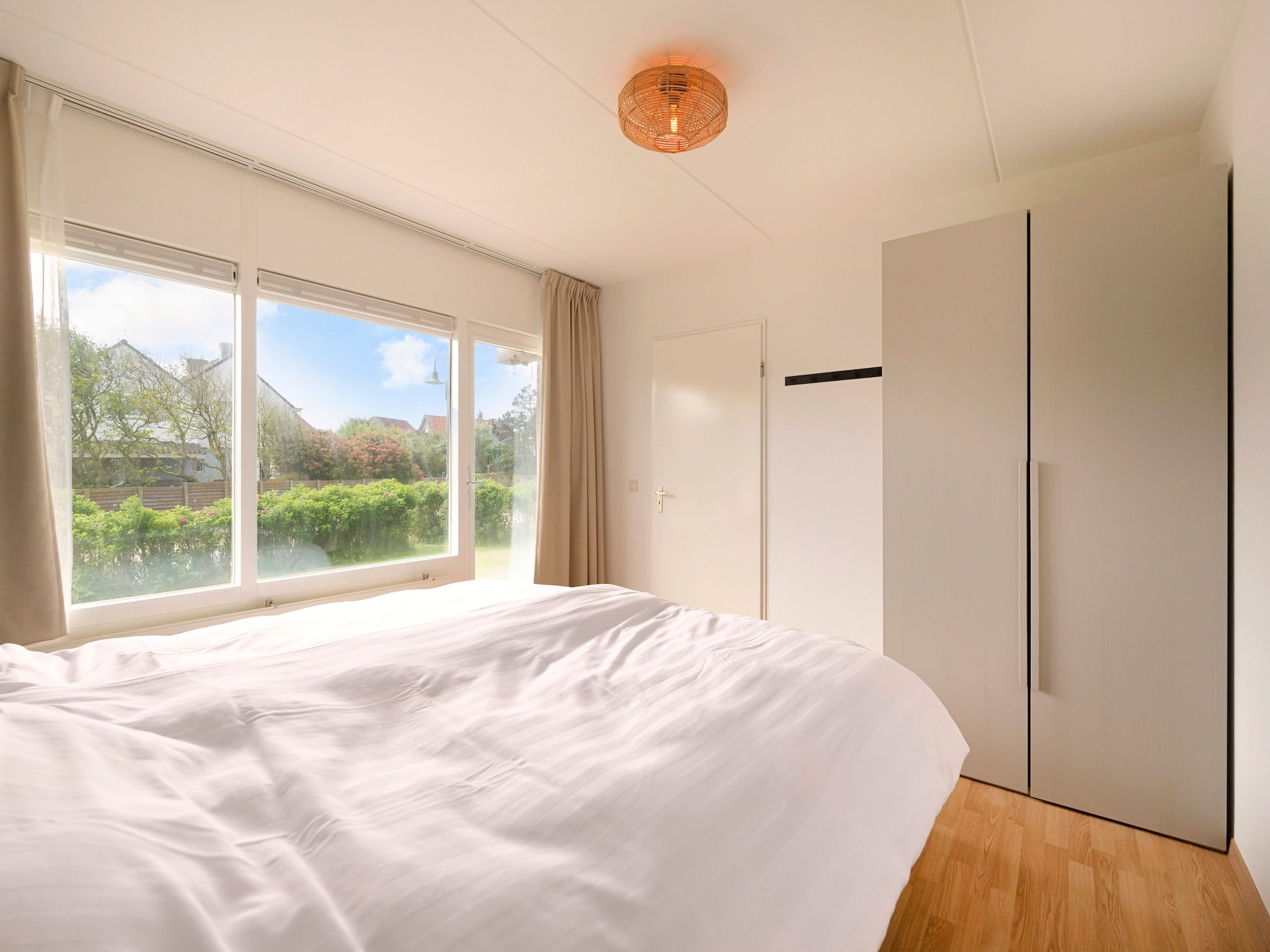 Een slaapkamer van Beach Appartement 13 in Callantsoog