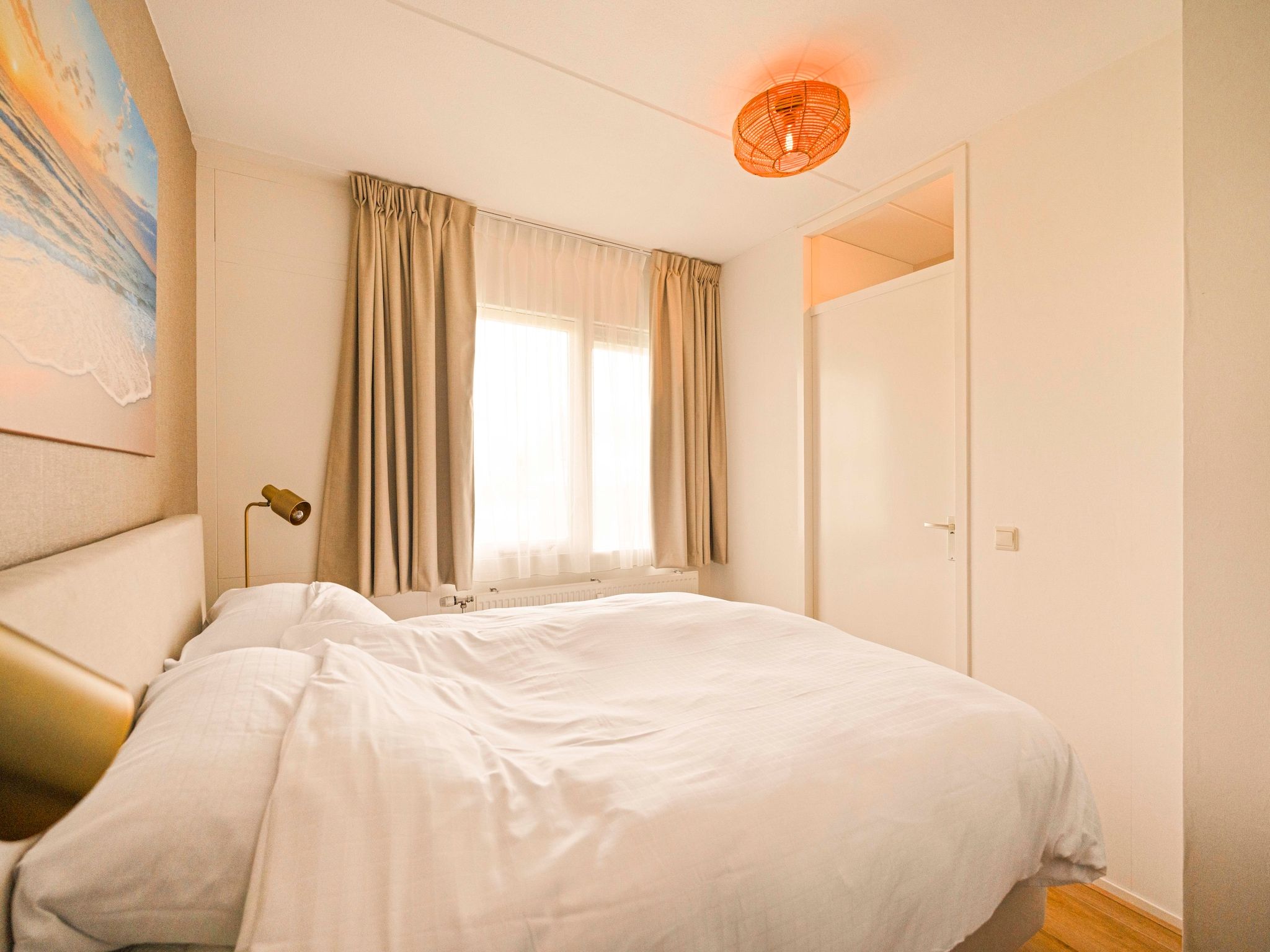 Een slaapkamer van Beach Appartement 13 in Callantsoog