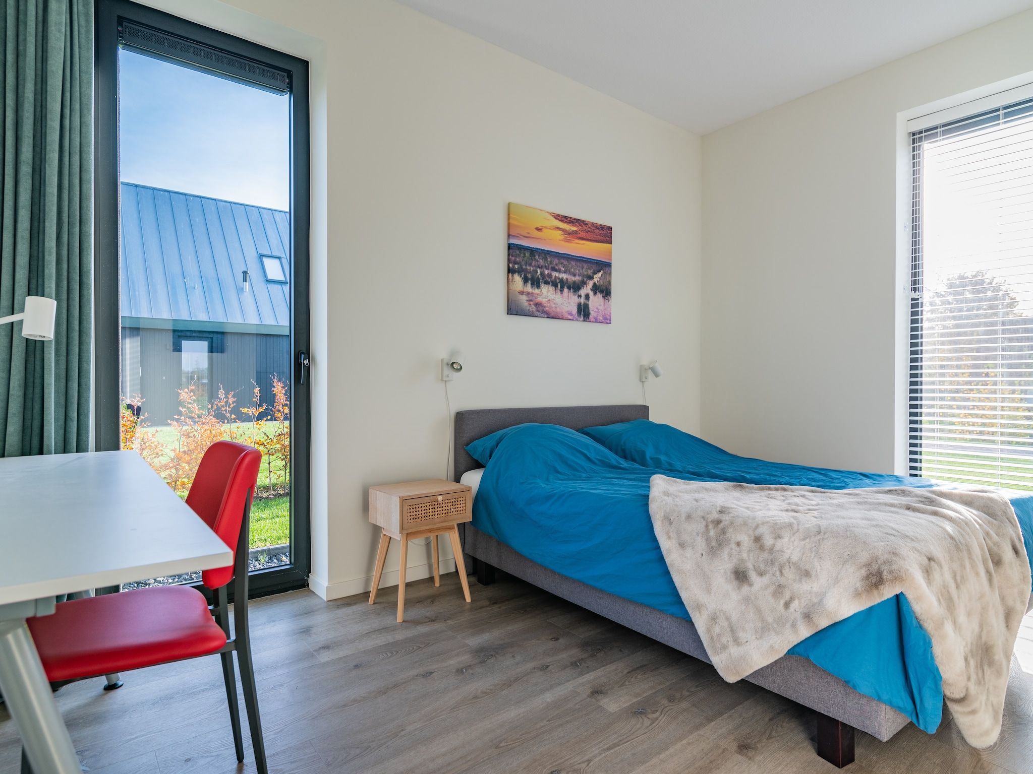 Een slaapkamer van Meer van Eysinga in Sint Nicolaasga
