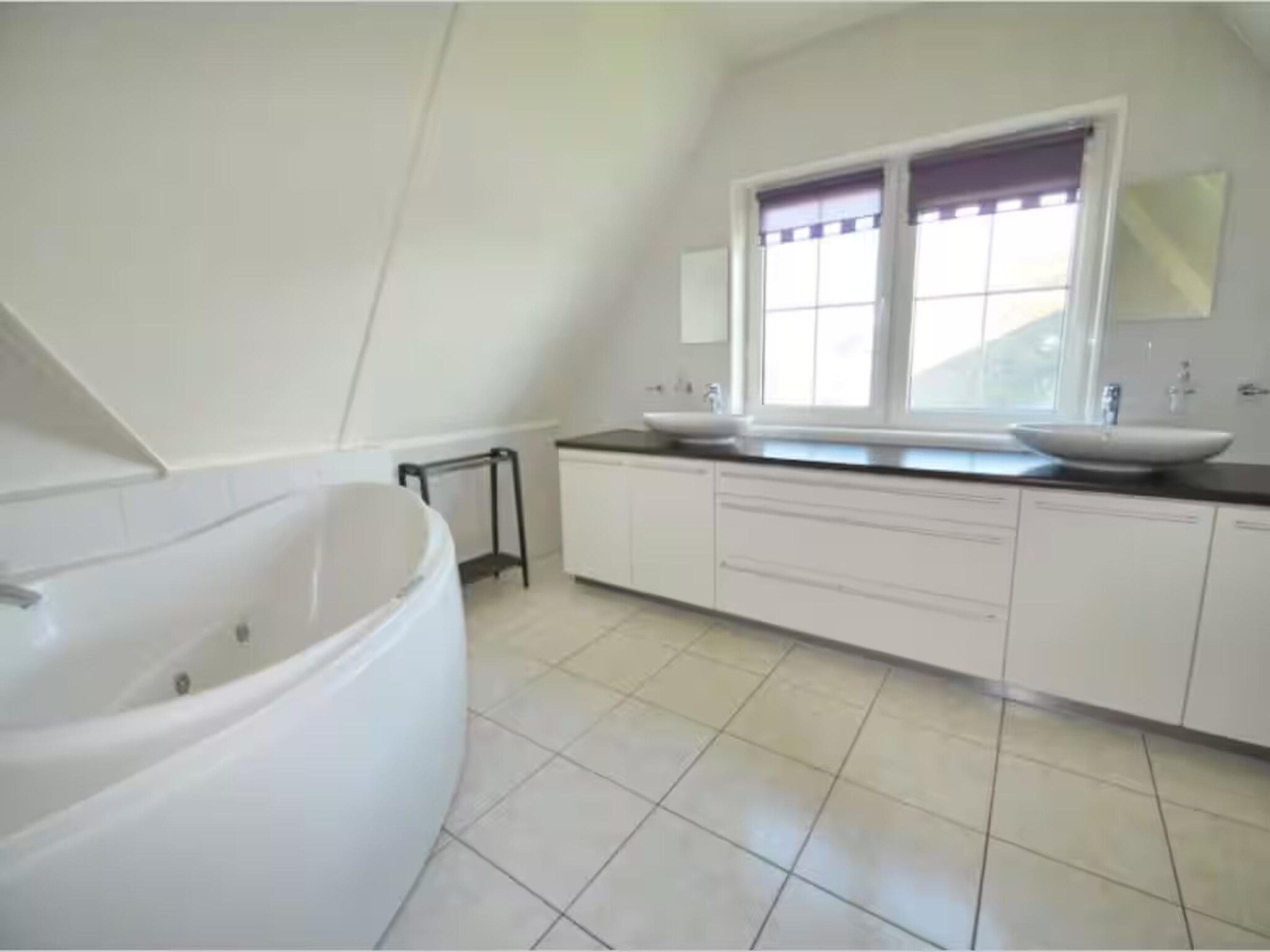 De badkamer van Villa in Makkum in Makkum