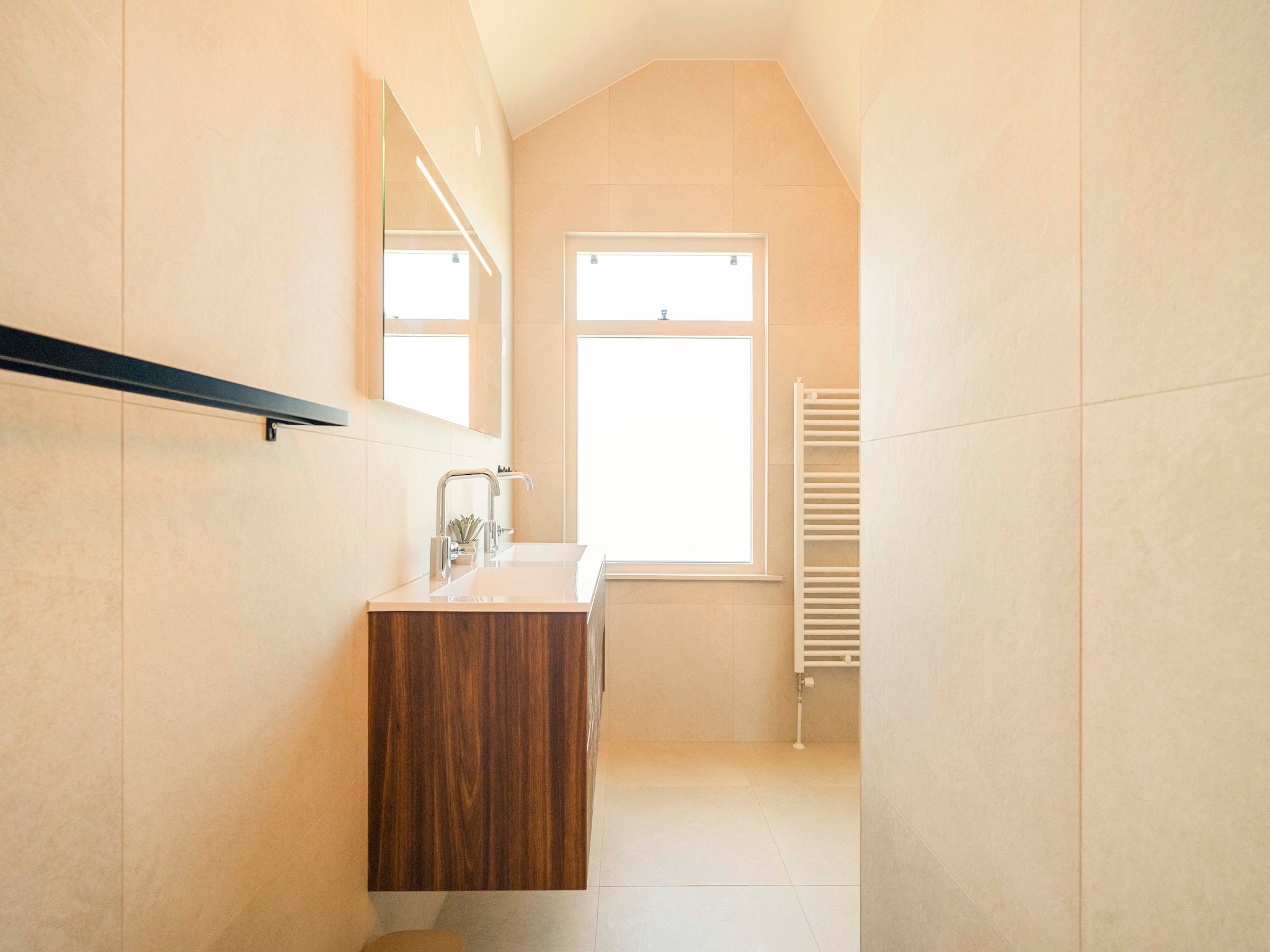De badkamer van Strandslag Bungalow 68 in Julianadorp