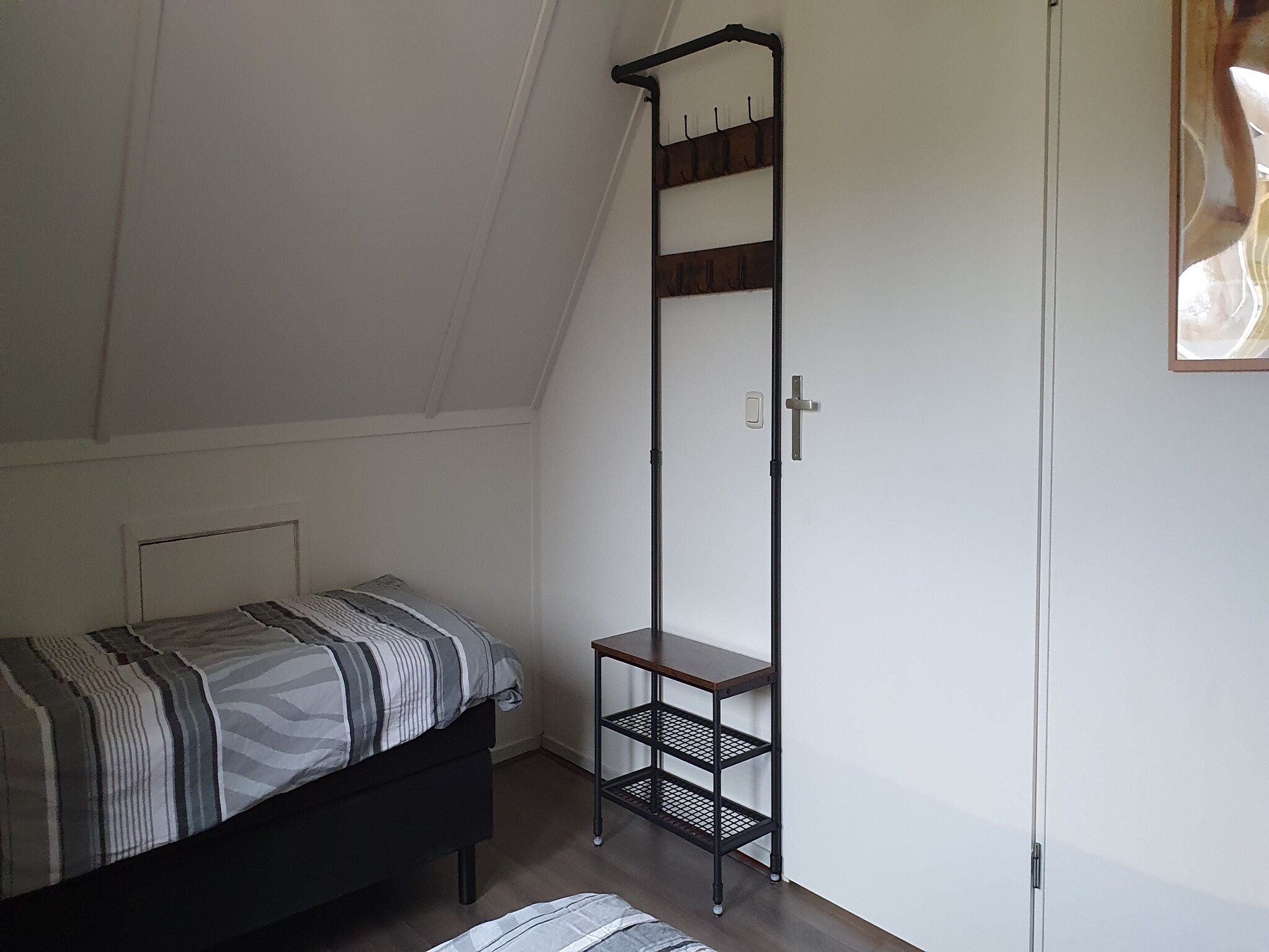 Een slaapkamer van Bargereed 66 in Tzummarum