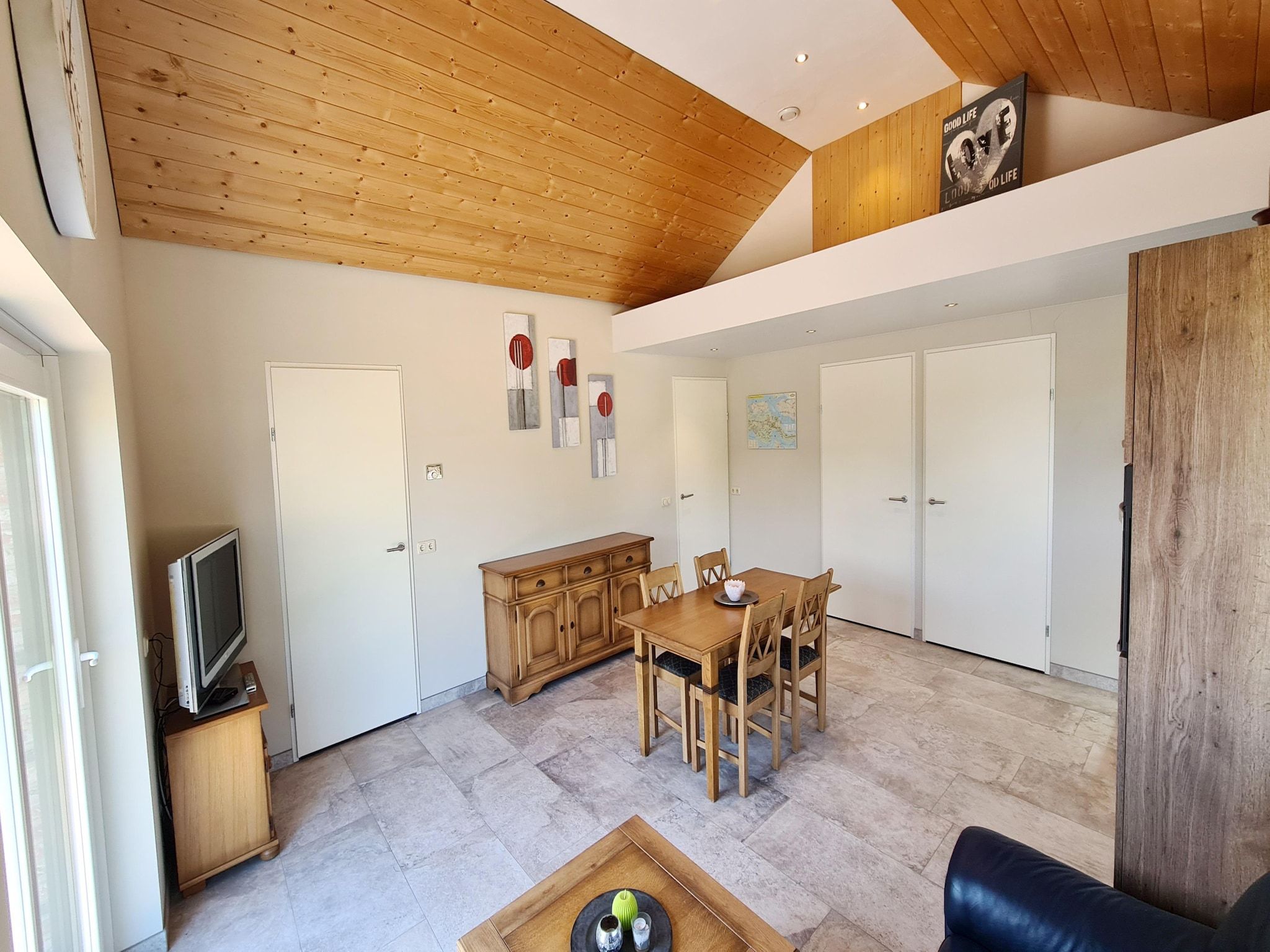 De woonkamer van 2 fijne Zeeuwse huisjes in Baarland