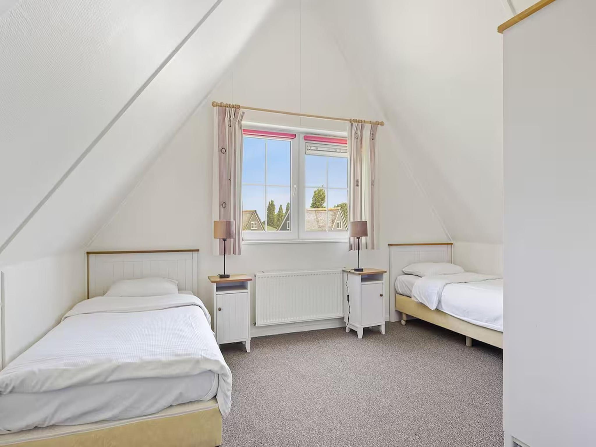 Een slaapkamer van Villa in Makkum in Makkum