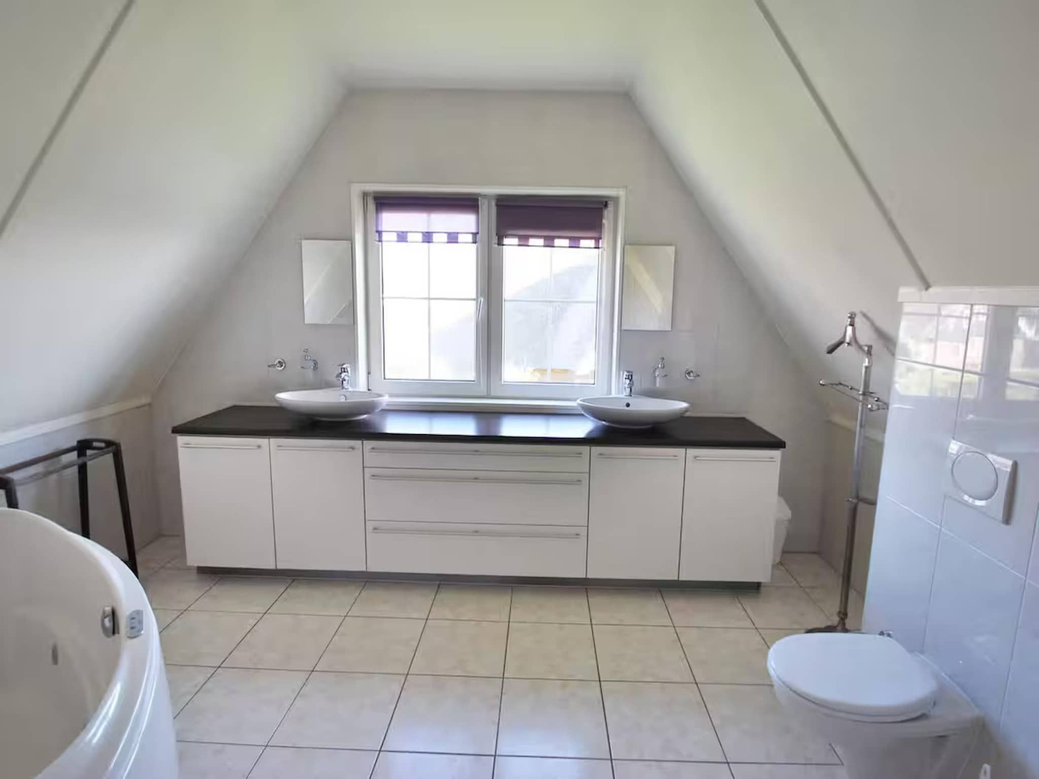 De badkamer van Villa in Makkum in Makkum