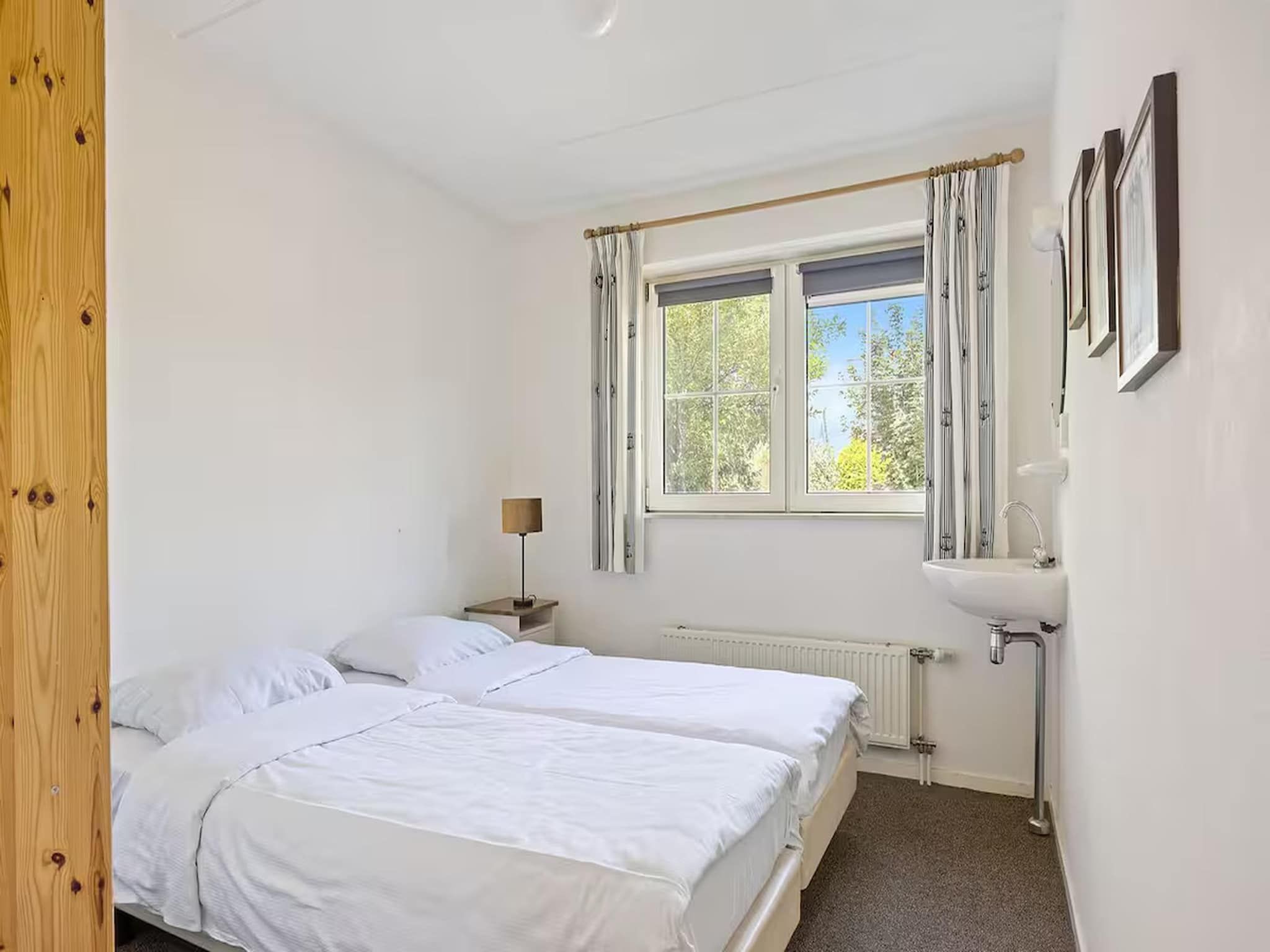 Een slaapkamer van Villa in Makkum in Makkum