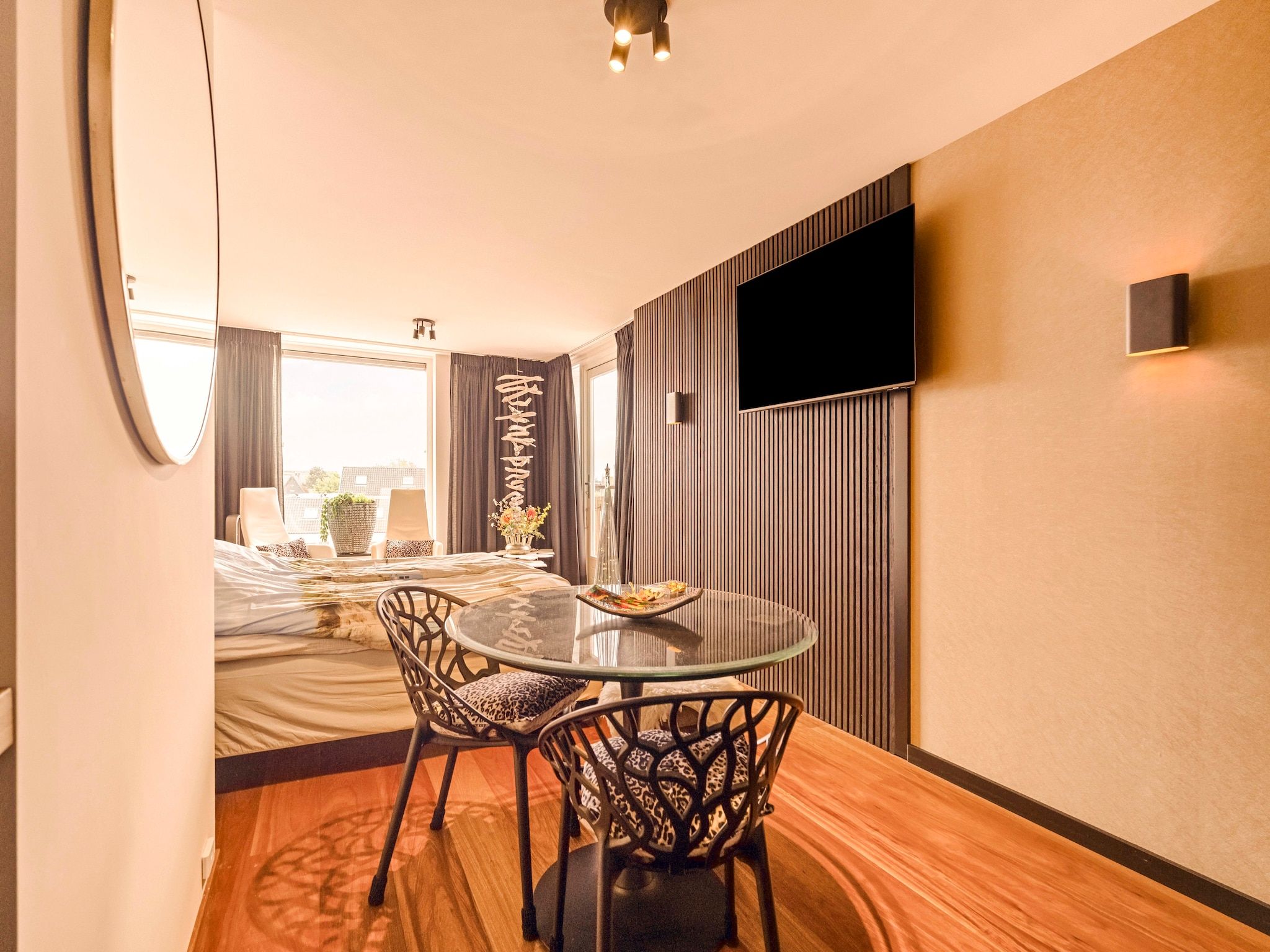 Een slaapkamer van Suite "At the Beach" 23D in Callantsoog