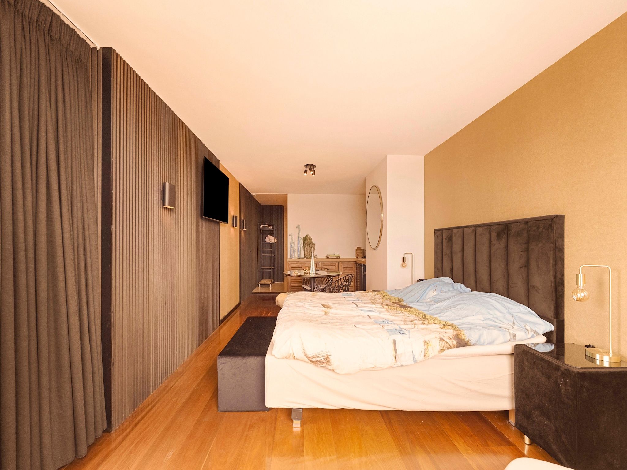 Een slaapkamer van Suite "At the Beach" 23D in Callantsoog