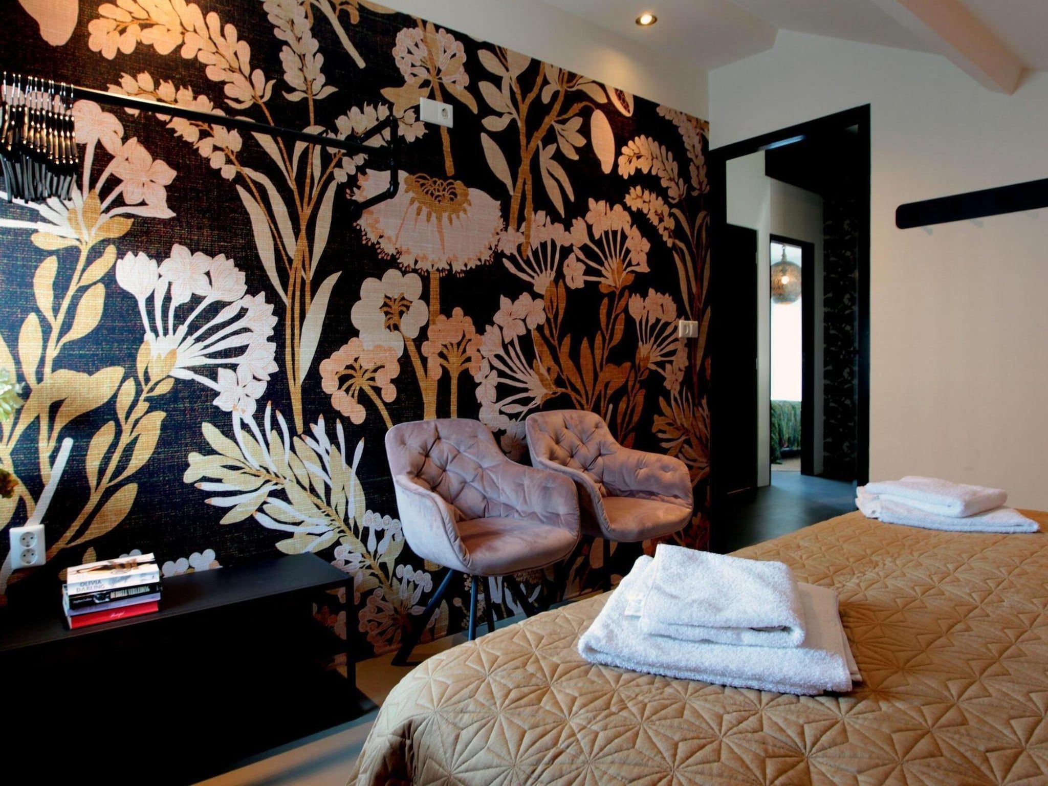 Een slaapkamer van 8-14 person group accommodation in Schoorl