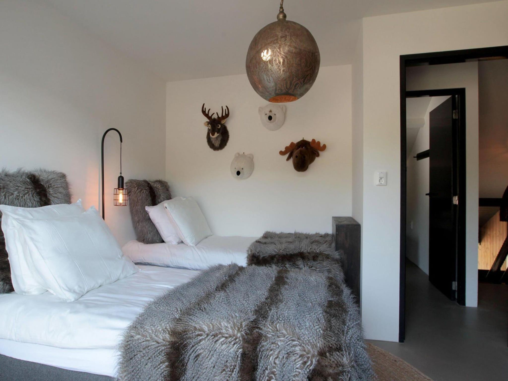 Een slaapkamer van 8-14 person group accommodation in Schoorl