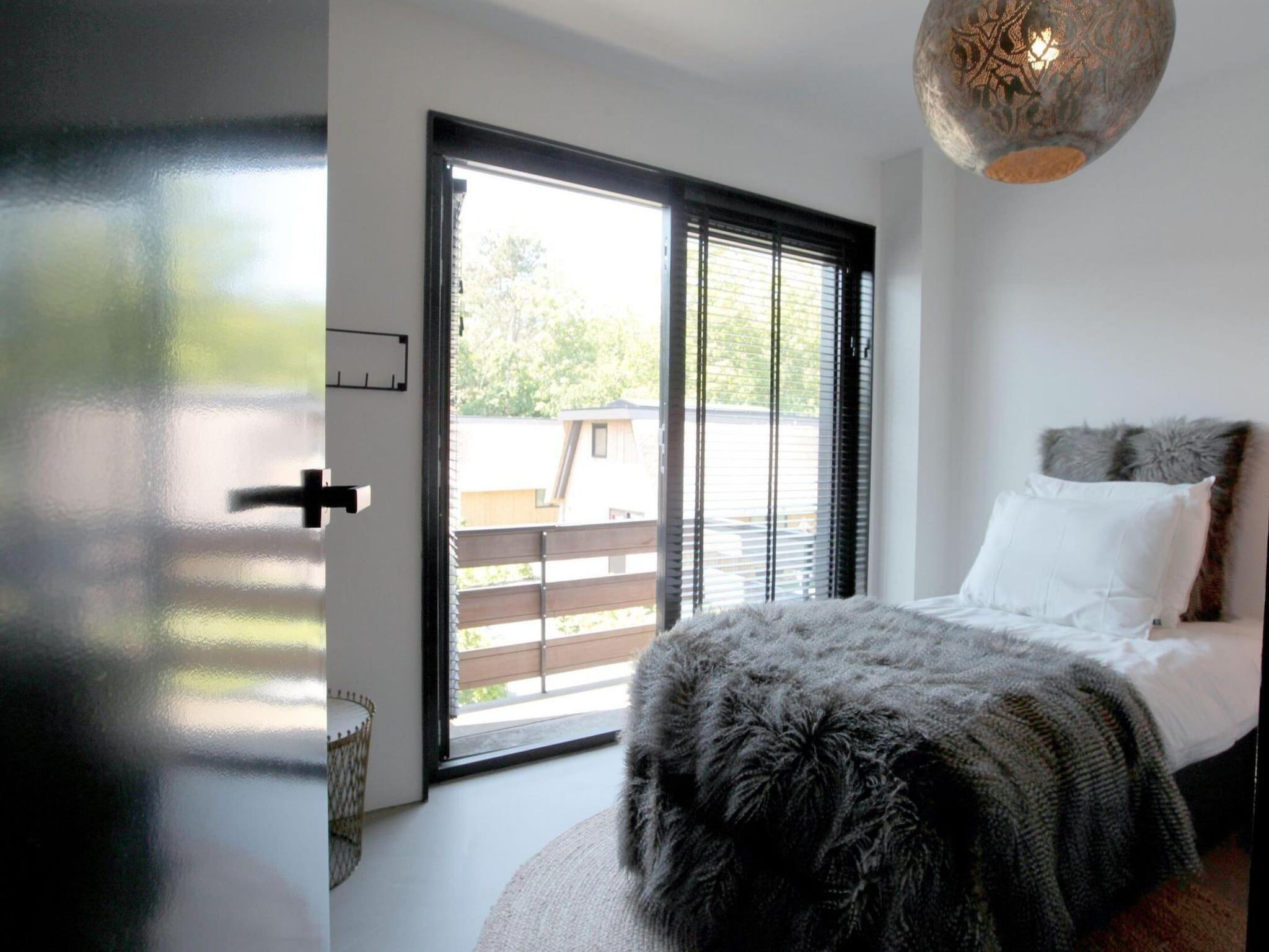 Een slaapkamer van 8-14 person group accommodation in Schoorl