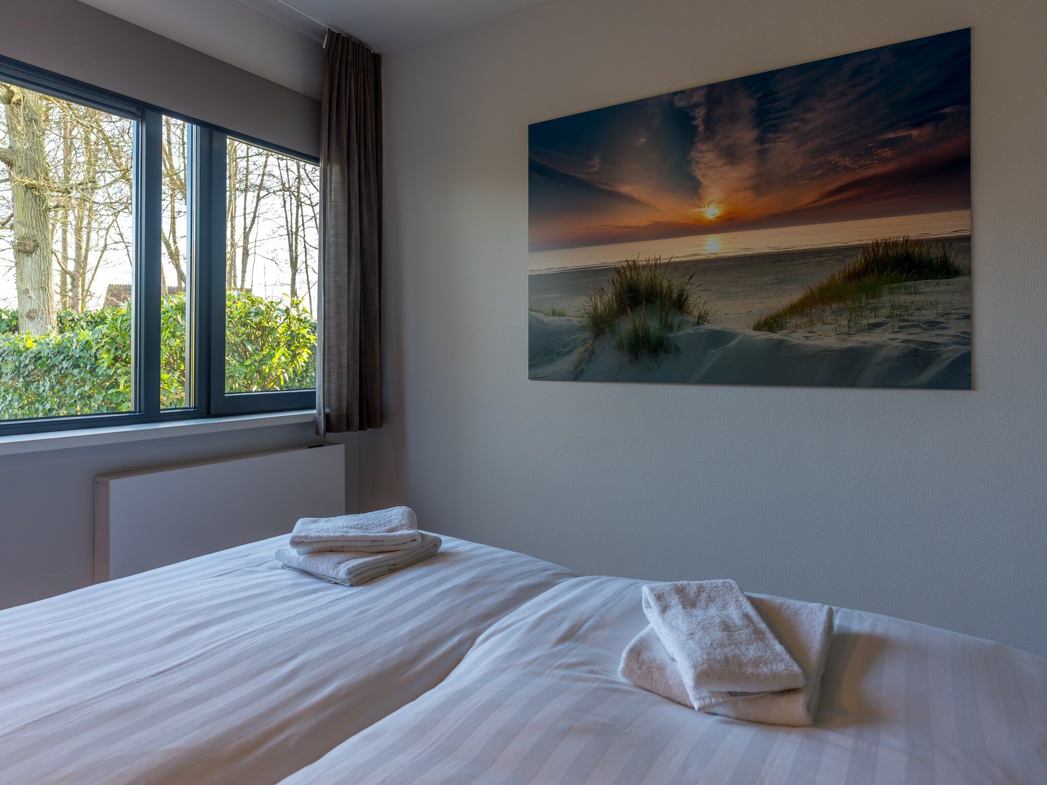 Een slaapkamer van Zee Bries in De Koog