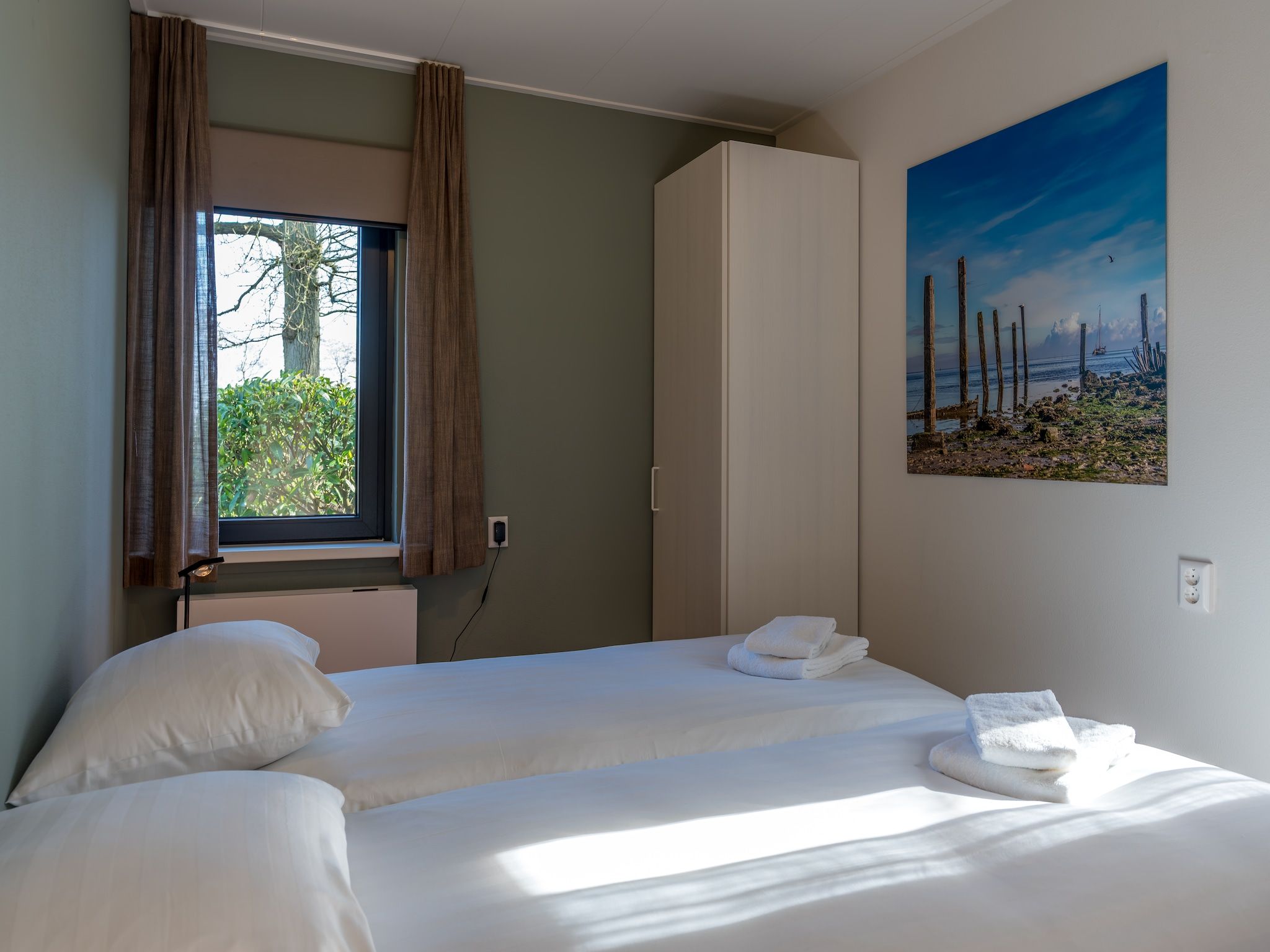 Een slaapkamer van Zee Bries in De Koog