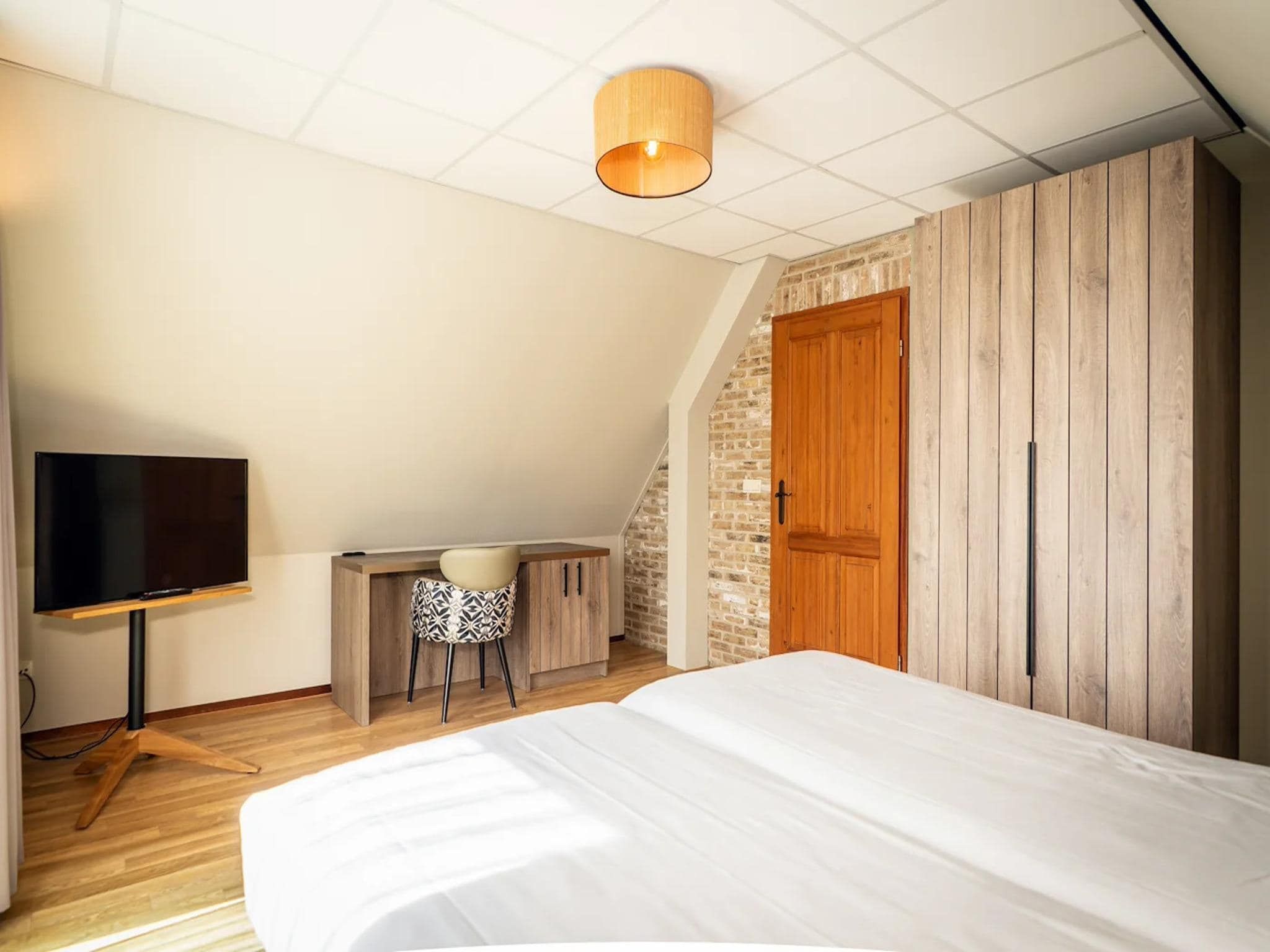 Een slaapkamer van Villas 202 and 208 in De Koog