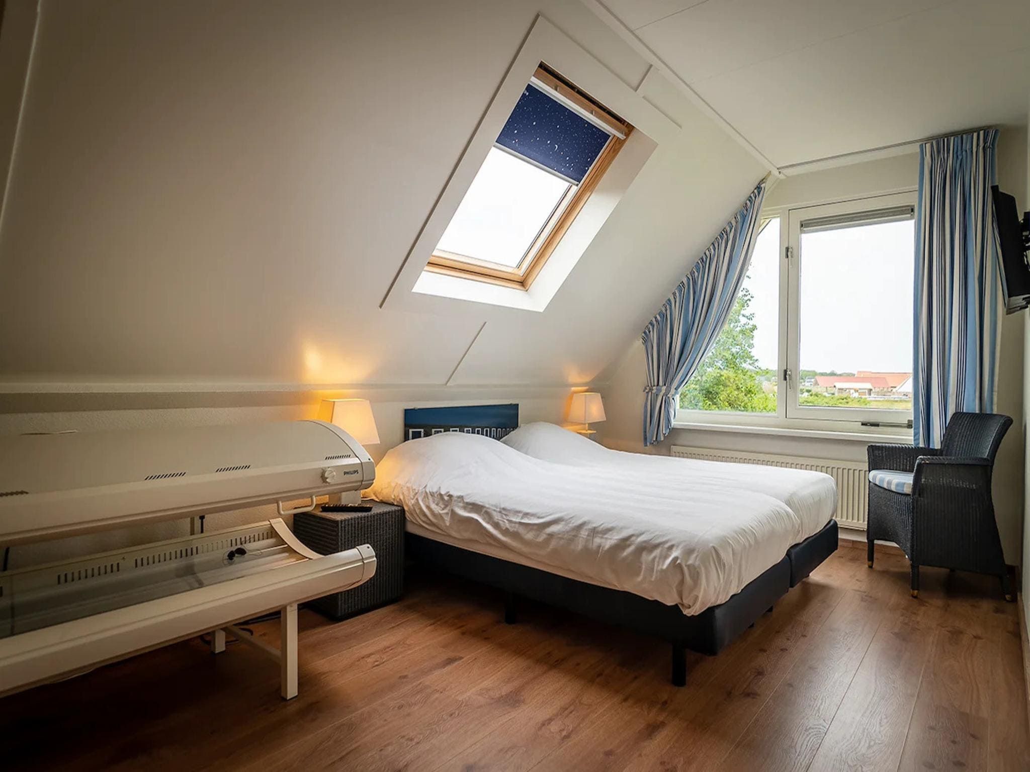 Een slaapkamer van 6-person luxury villa with 2 bathrooms on Texel in De Koog