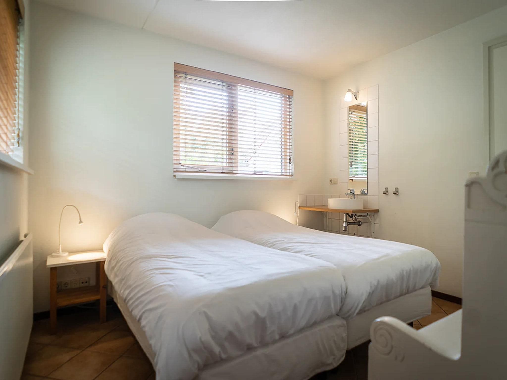 Een slaapkamer van 6-person luxury villa with 2 bathrooms on Texel in De Koog