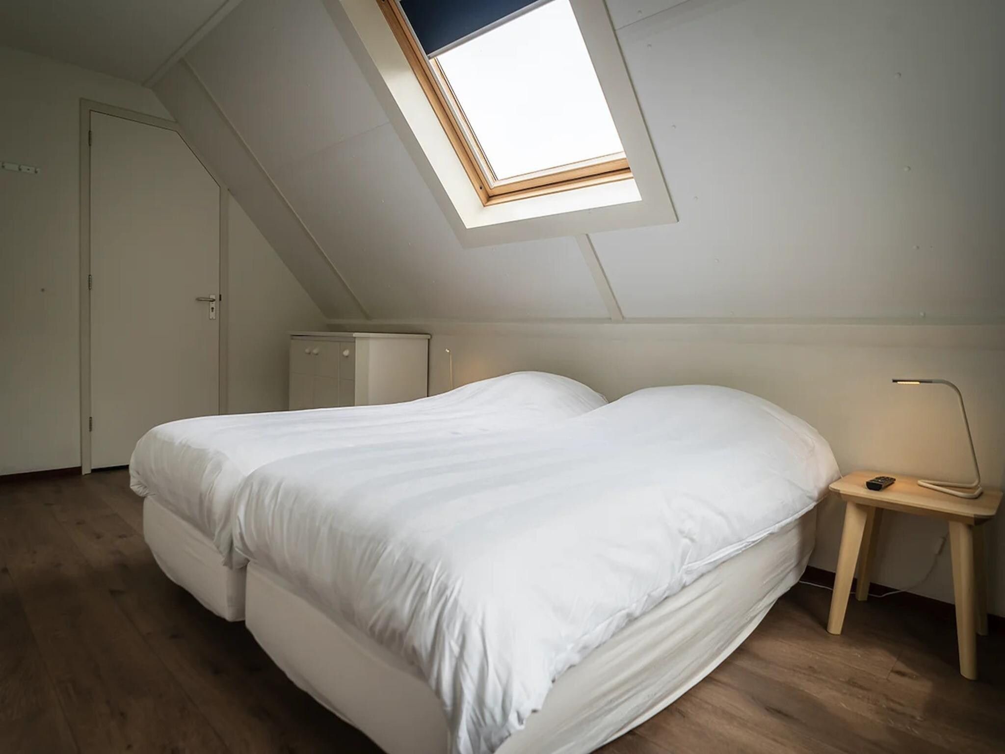 Een slaapkamer van 6-person luxury villa with 2 bathrooms on Texel in De Koog