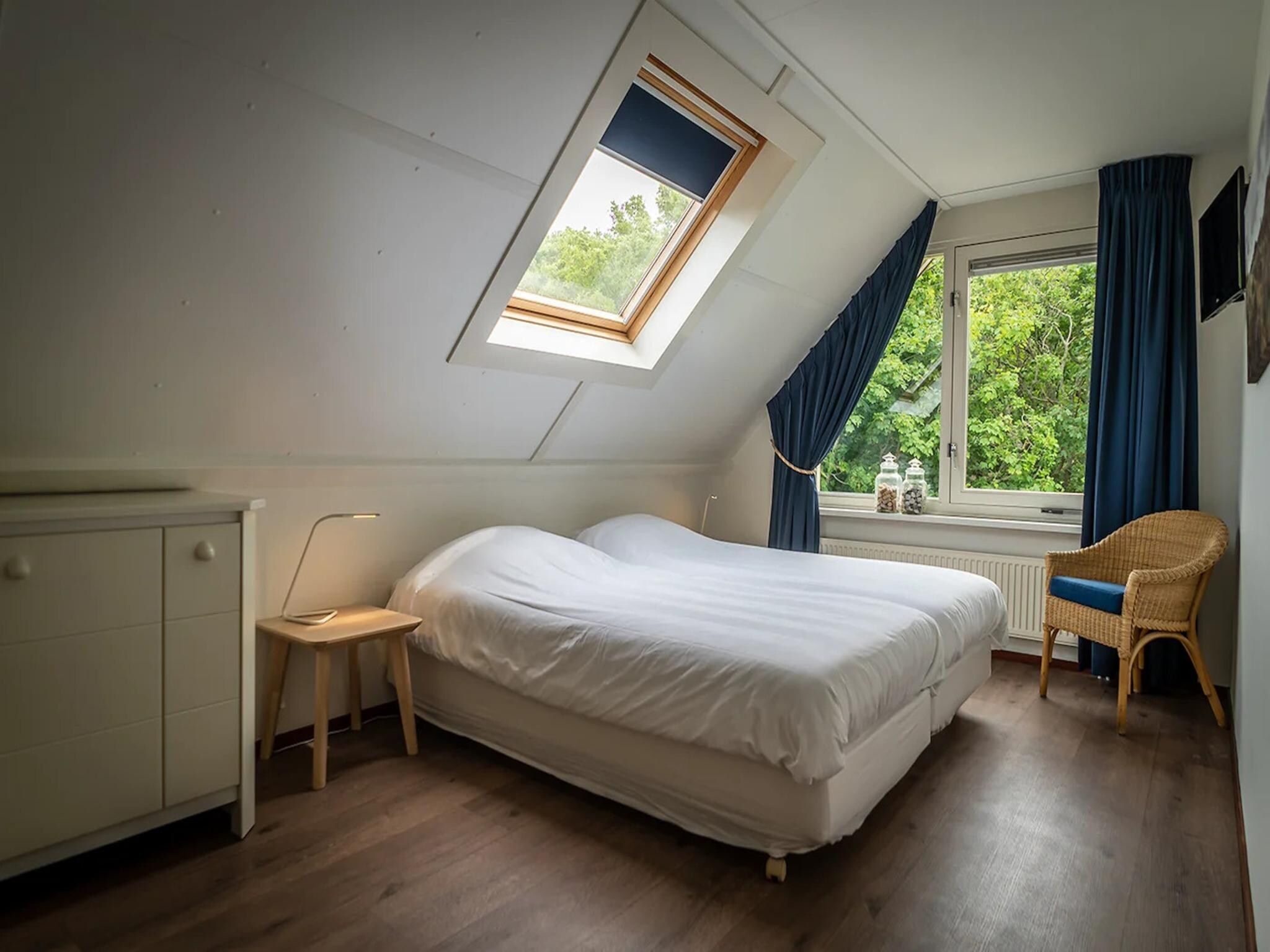 Een slaapkamer van 6-person luxury villa with 2 bathrooms on Texel in De Koog