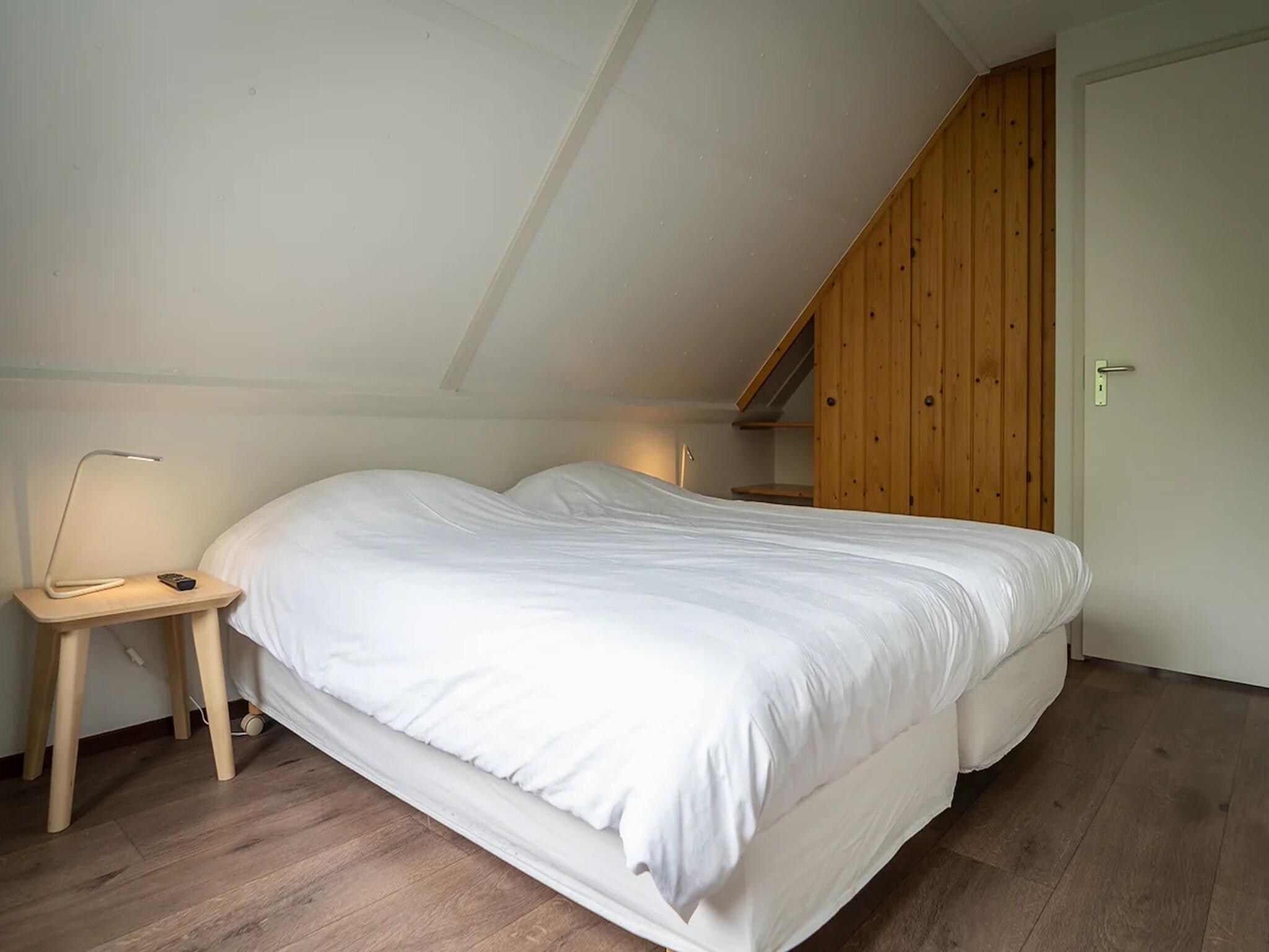 Een slaapkamer van 6-person luxury villa with 2 bathrooms on Texel in De Koog