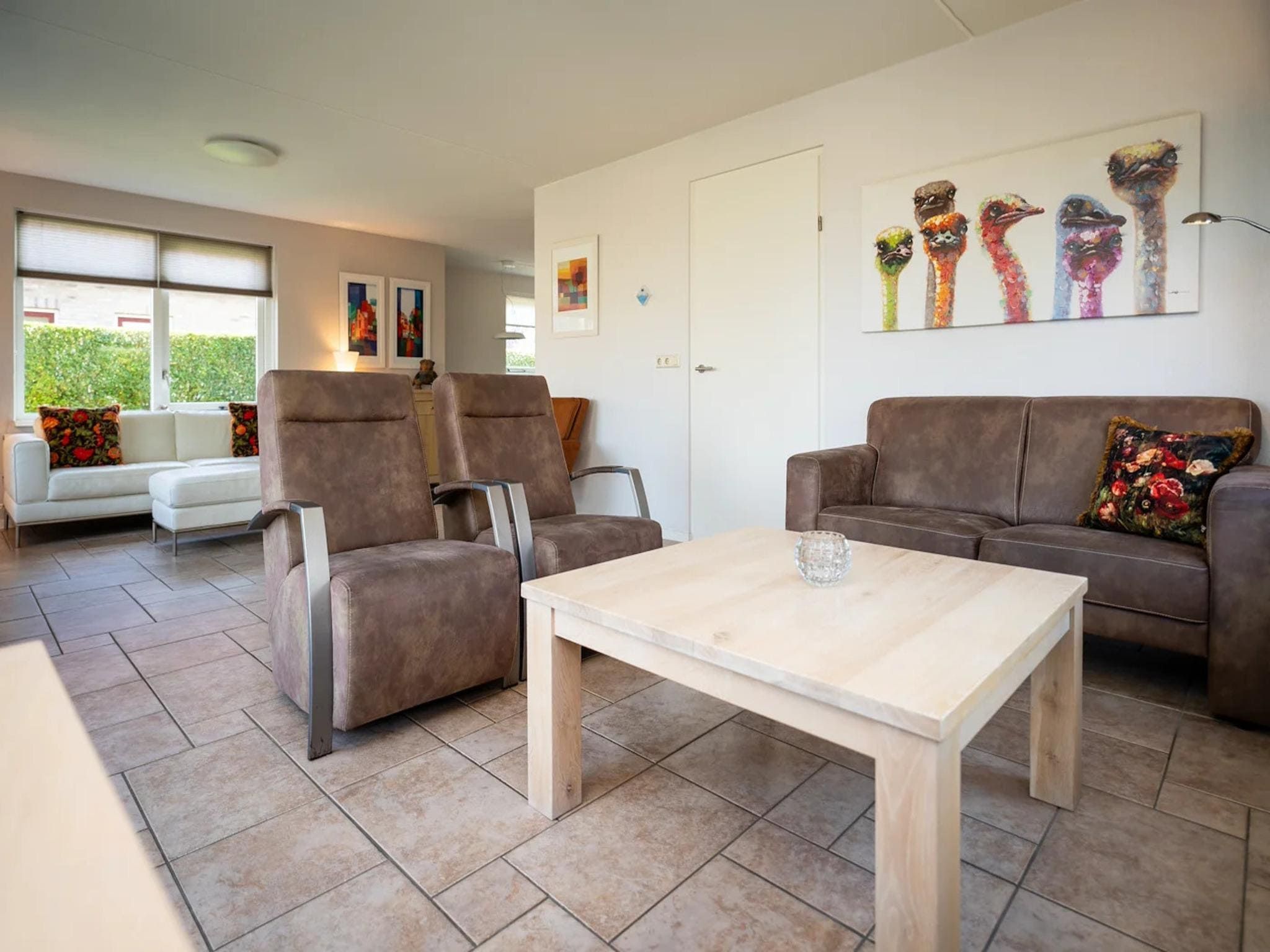 De woonkamer van Luxury 4-person villa in a nature reserve on Texel in De Koog