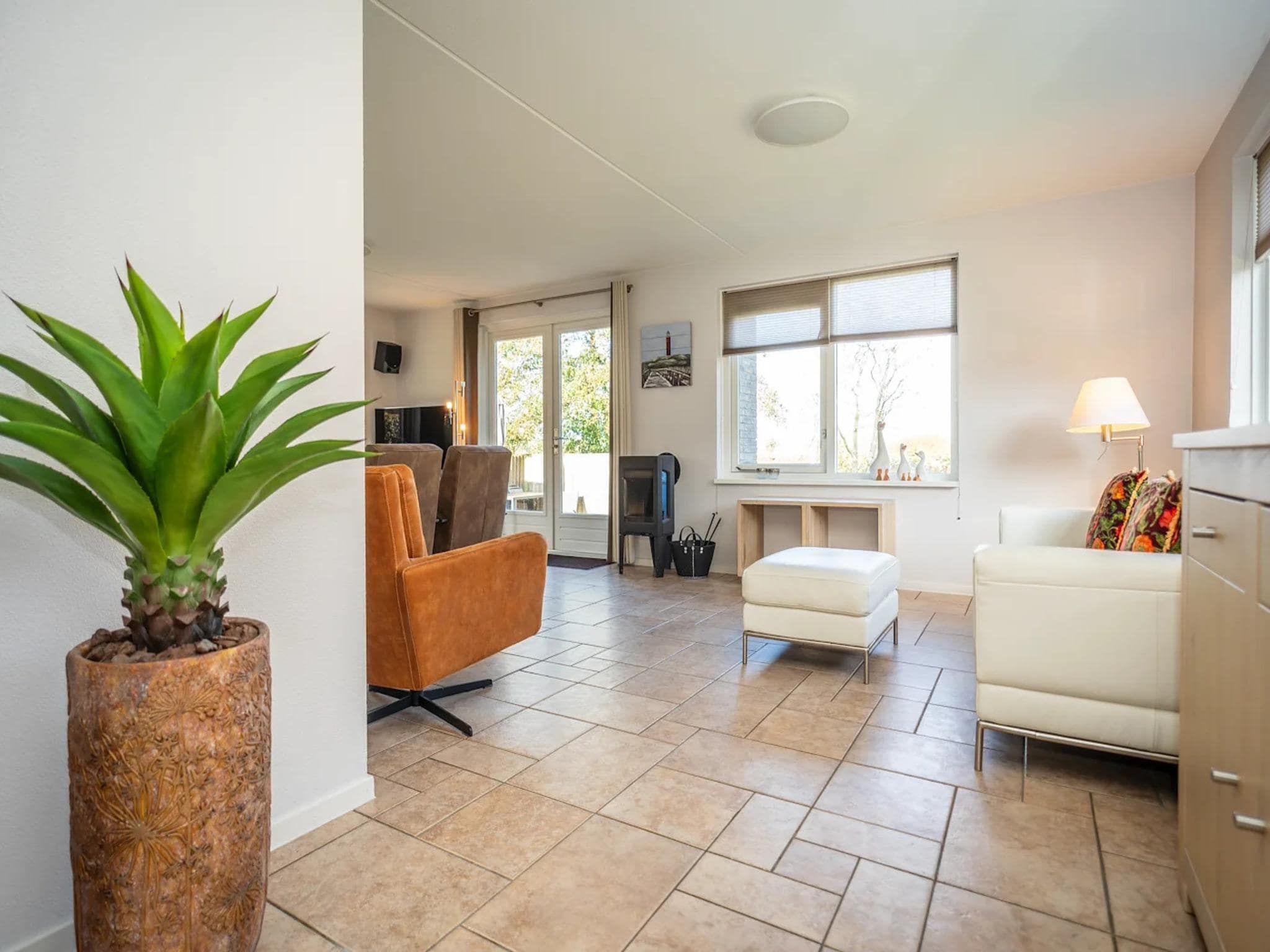 De woonkamer van Luxury 4-person villa in a nature reserve on Texel in De Koog