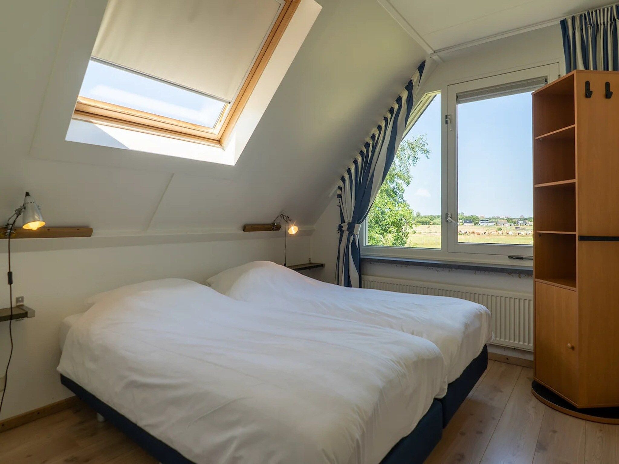 Een slaapkamer van 5-person luxury holiday villa on Texel in De Koog