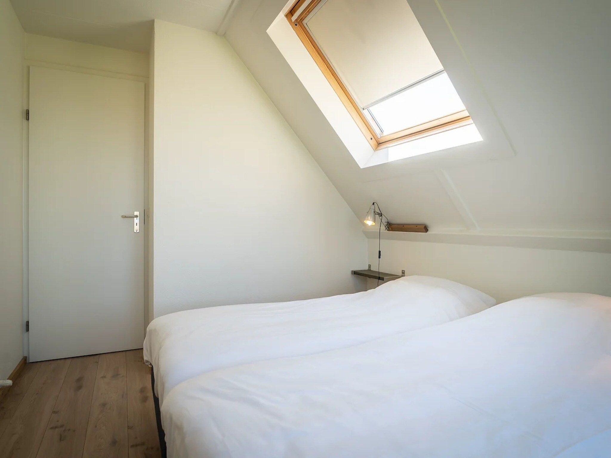 Een slaapkamer van 5-person luxury holiday villa on Texel in De Koog